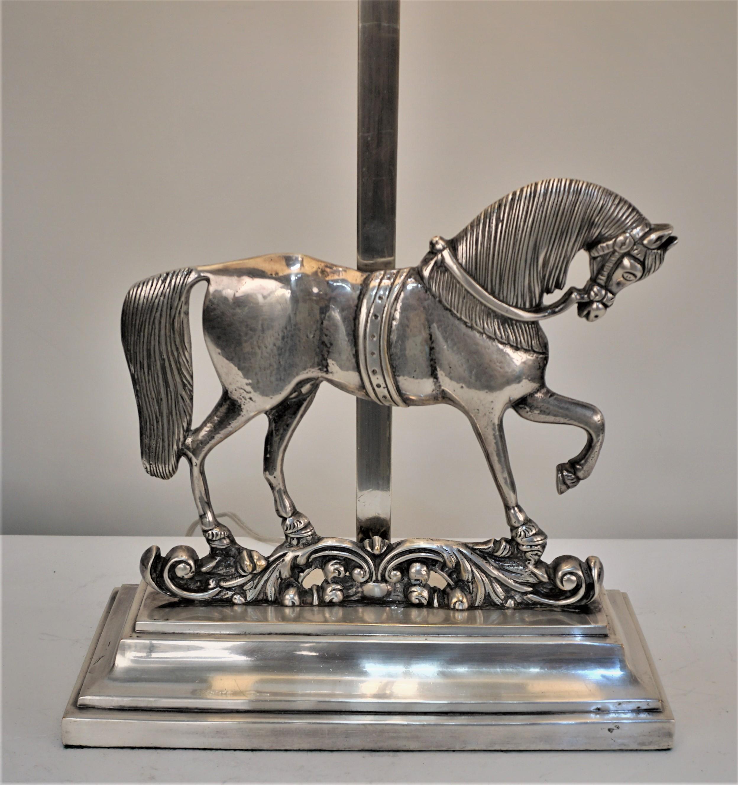 1970's silver over bronze horse in simple classic design Spanish table lamp, fitted with square hardback silk lampshade.
3way socket, 250watts max.