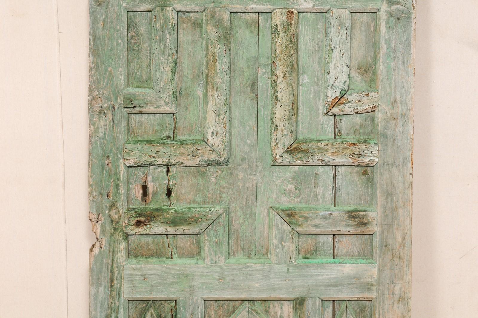 Wood Spanish 19th Century Geometric Paneled Door with Its Original Green Paint For Sale