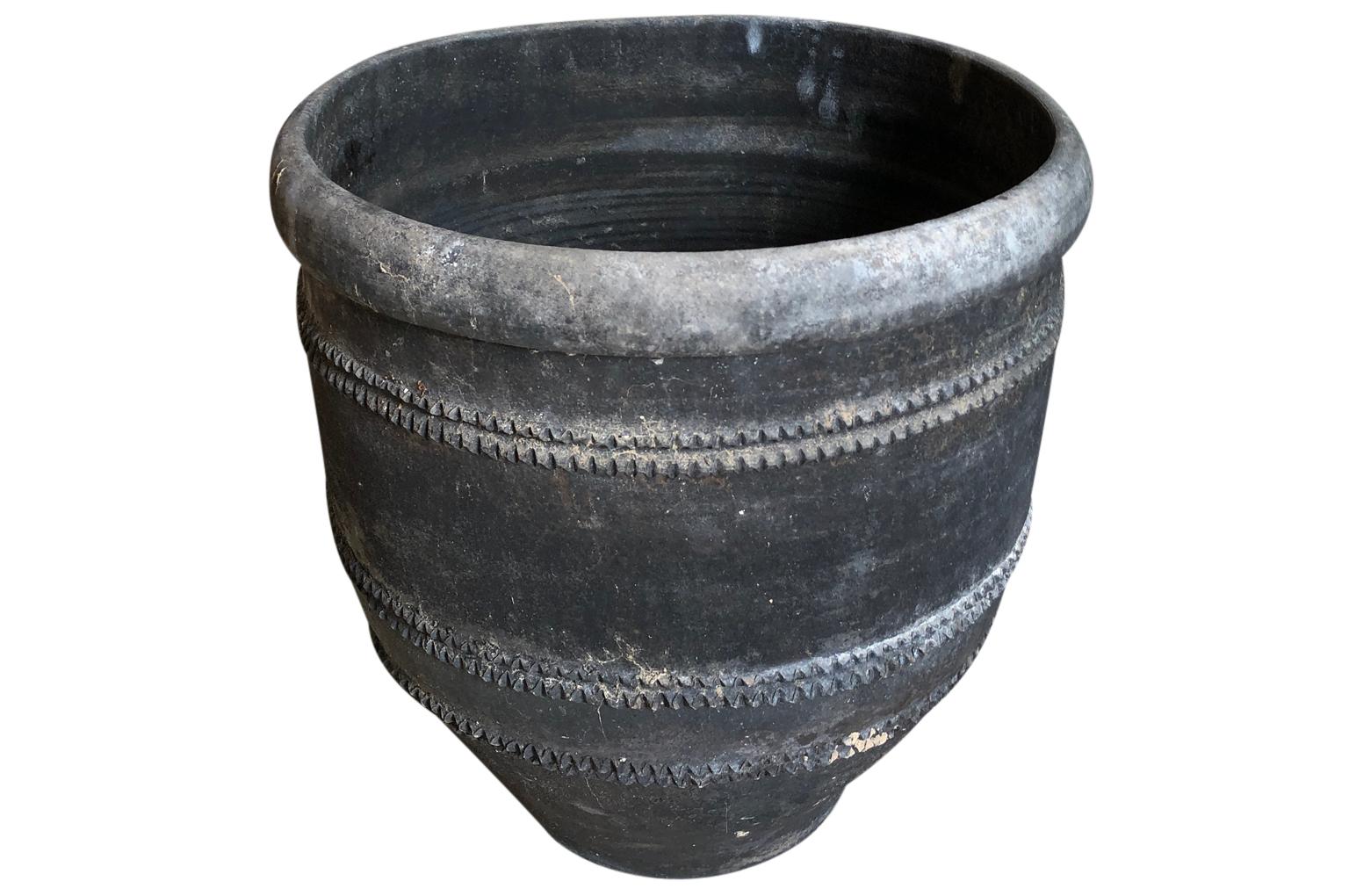 A rare and stunning black terracotta urn from the Girona area of Spain. Beautiful patina and condition. A wonderful piece for any interior of exterior.