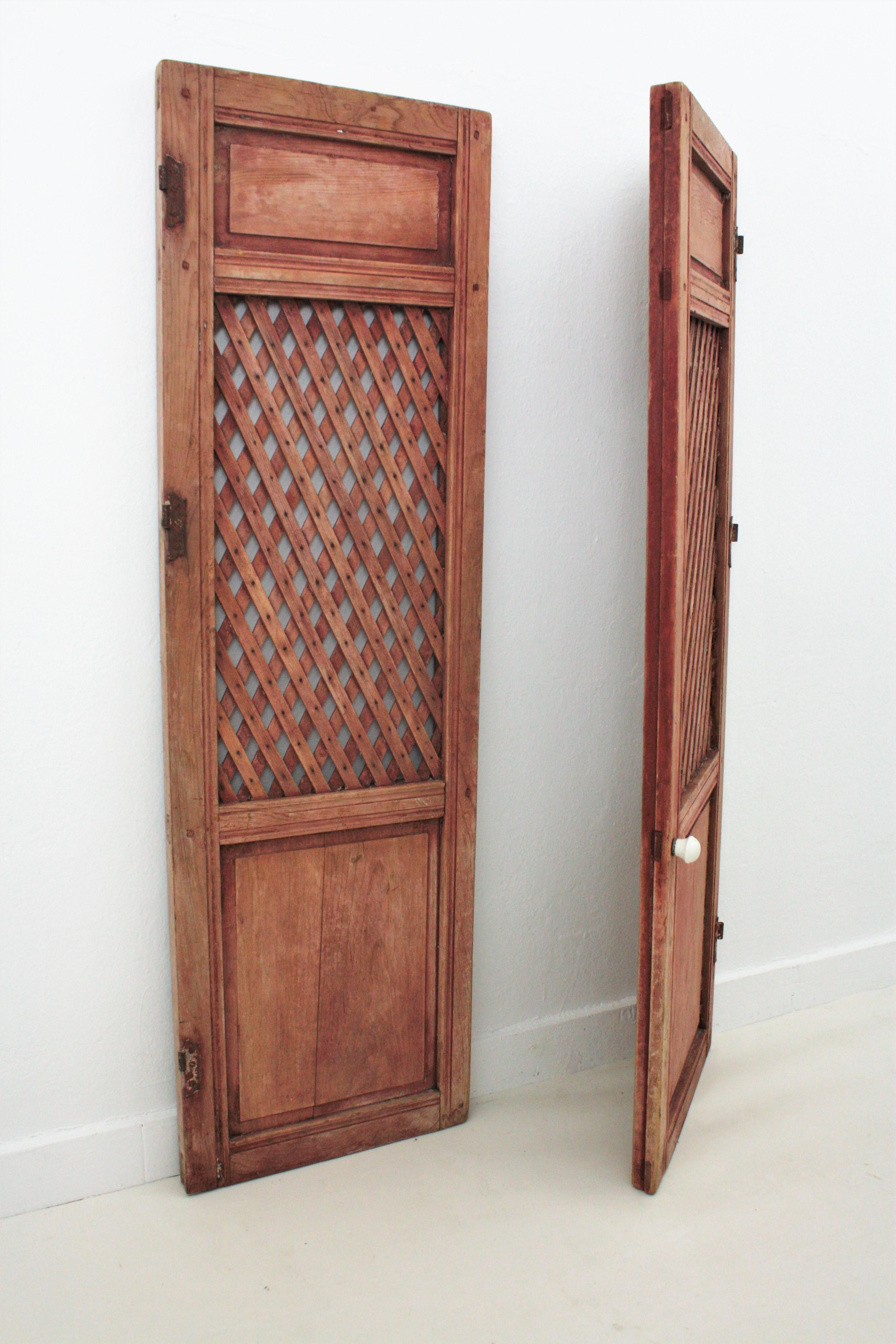 19th Century Spanish Carved Wood Lattice Rustic Doors, Pair For Sale