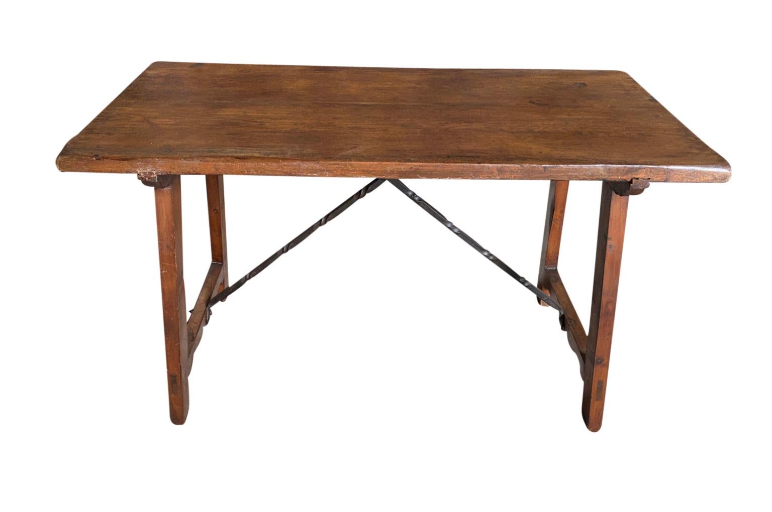 A very handsome 19th century Console Table - Side Table from the Catalan region of Spain.  Wonderfully constructed from richly stained pine and hand forged stretchers.  Terrific patina - warm & luminous.  Very chic minimalist design.