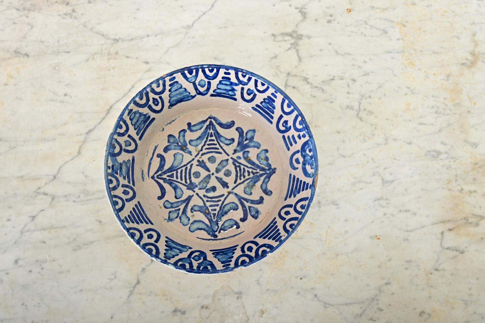 A charming, handpainted terracotta lebrillo bowl from Granada, Spain (19th century)–these illustrative ceramic works collectively known as fajalauza pottery can be traced back to at least the 16th century, deeply influenced by the Moorish presence