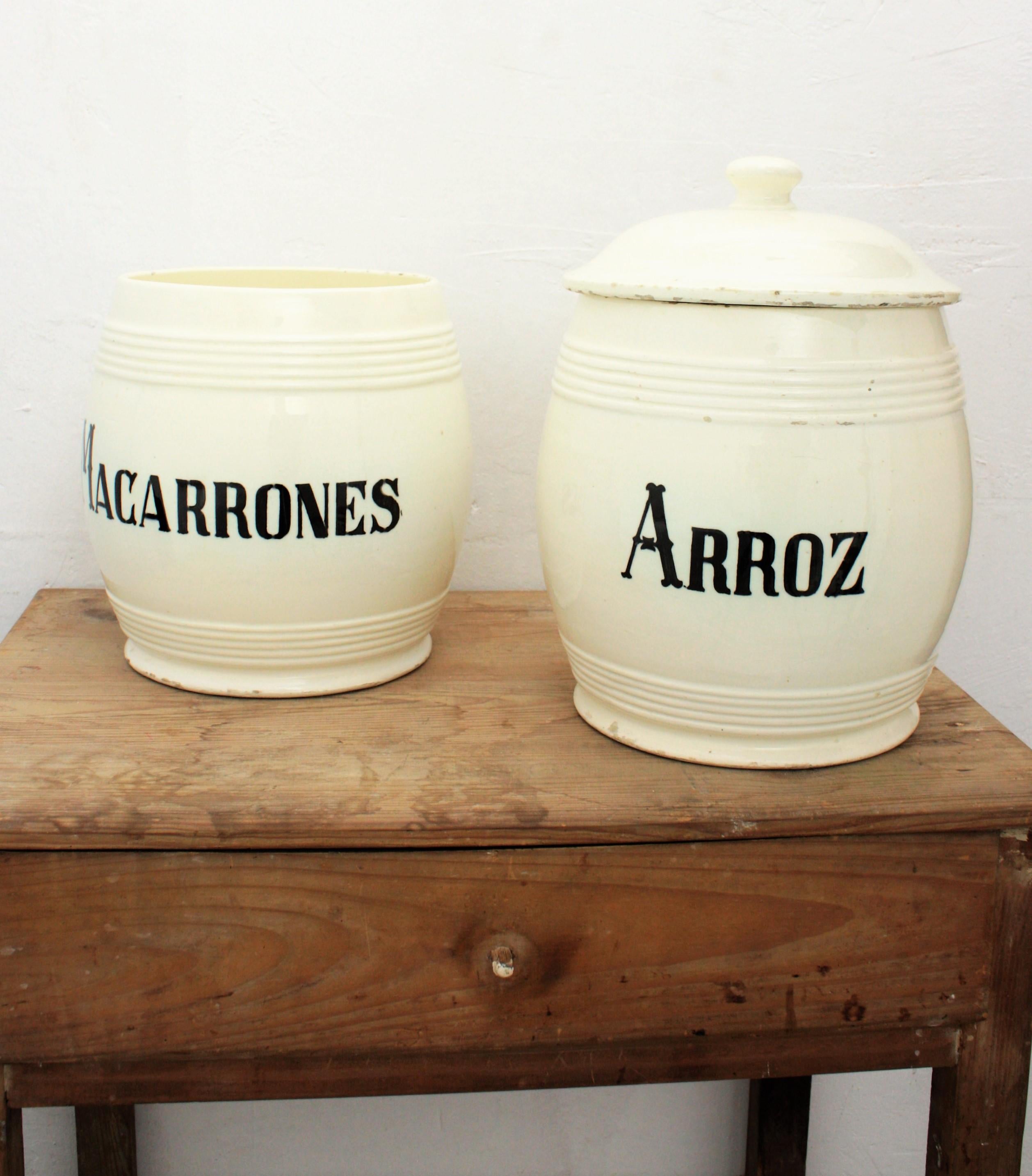 A set of two large glazed ceramic kitchen canisters / storage pots. Spain, circa 1890.
A highly decorative set of two antique kitchen pots used for storage: Macarrones (macaroni) and Arroz (rice). Lovely to be used for storage, decorative purposes