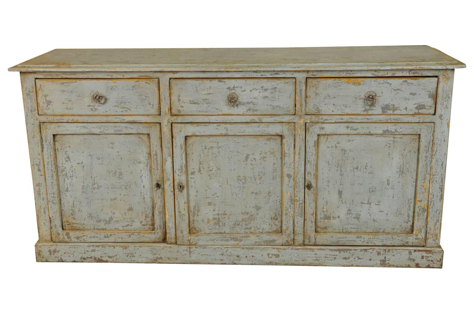 A wonderful three-door buffet from the Catalan region of Spain. Handsomely constructed from painted wood with three doors and three drawers. A terrific storage piece with nice narrow depth.