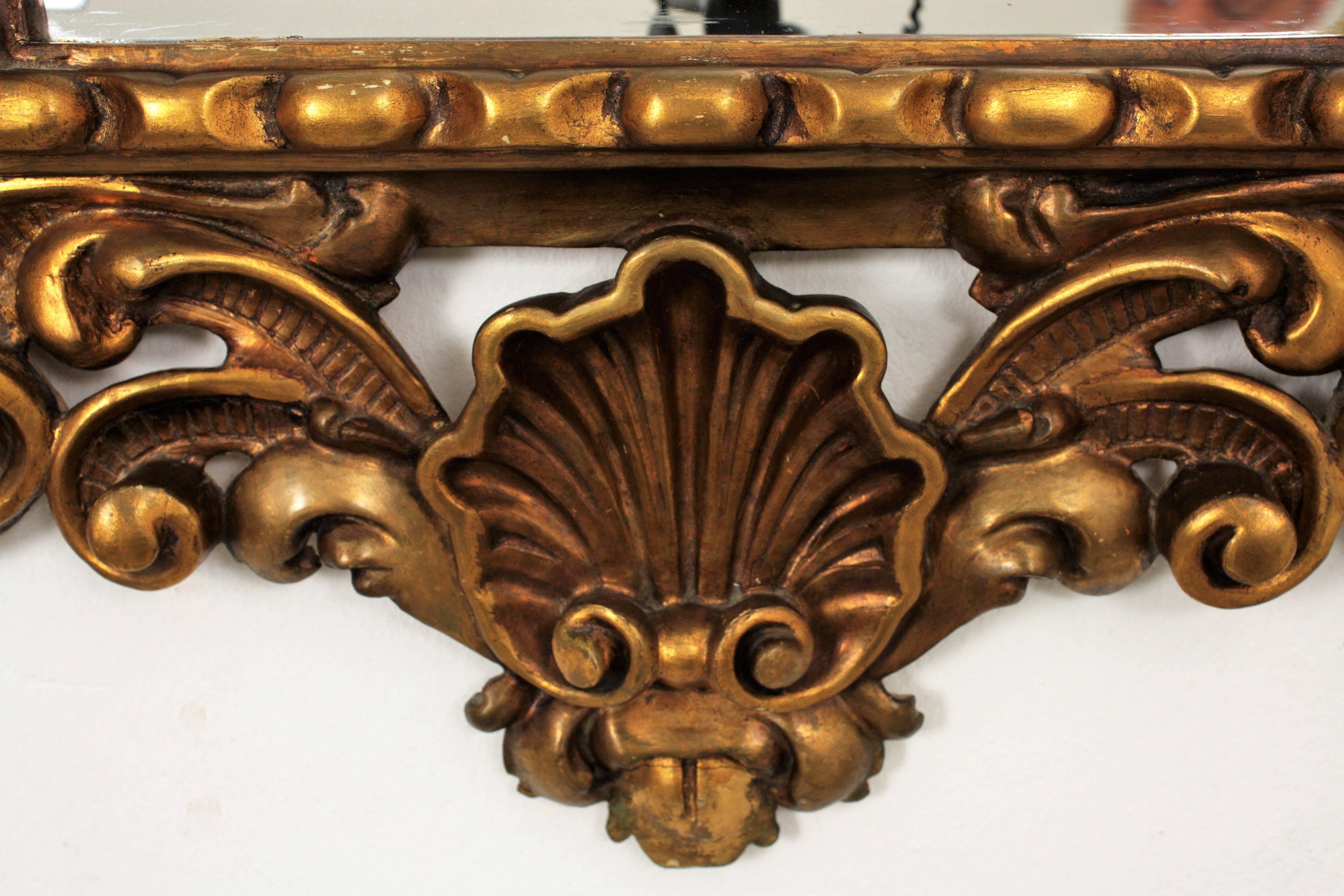 Hand-Carved Spanish Rococo Style Foliage Carved Giltwood Mirror For Sale