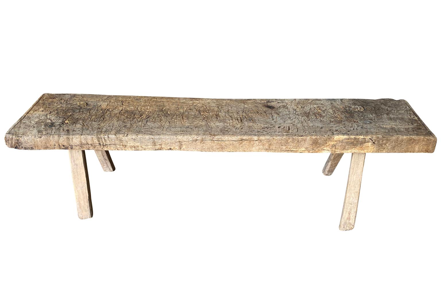 A =rustic 19th century Bench - Coffee Table from the Catalan region of Spain.  Soundly constructed from naturally washed oak with a solid board top and slightly splayed legs.  Super patina and graining.