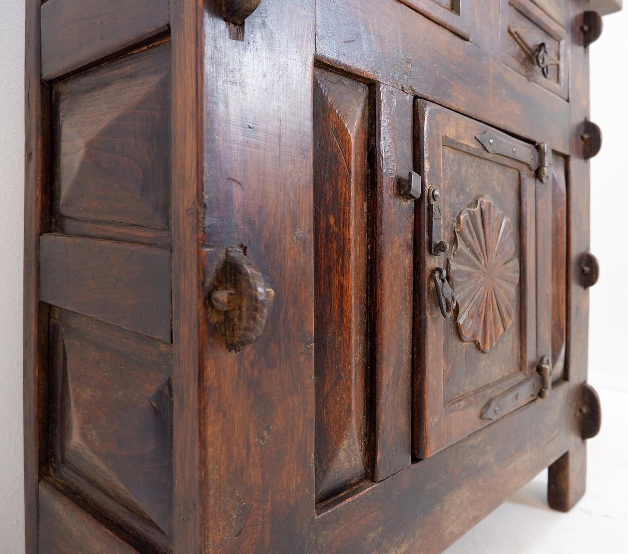 Spanish 20th Century Rustic Buffet - 2 drawers
Rustic Rural Decoration - 20th
Measures : 99x36cm H:93,5cm
Materials : Wood - Iron 
A fantastic Buffet from the Spanish Pyrenees region. Wonderfully constructed in richly stained wood with 2 drawers and
