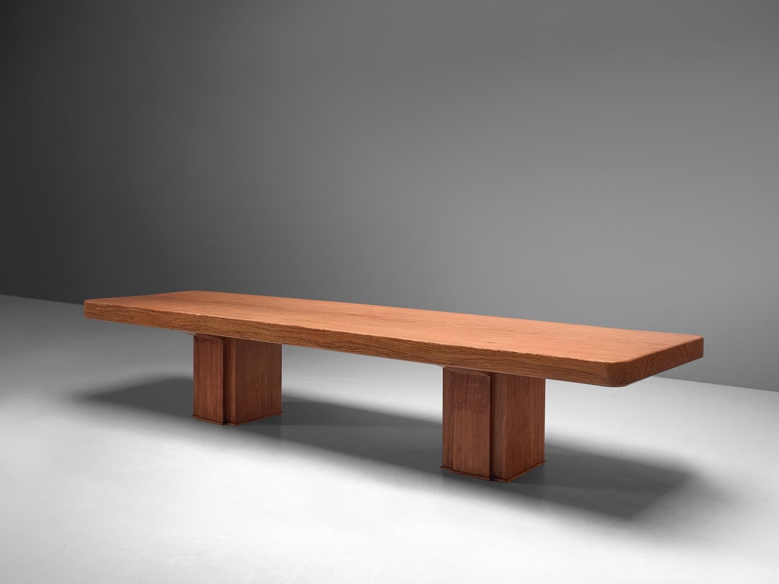 Dining table, bubinga wood, Spain, late1960s. Measures: 4mtr/ 13ft

Grand conference table made of the rare bubinga wood. This protected African hardwood may be loved as much for its quirky name as it is for its strength and beauty. The 4 meter