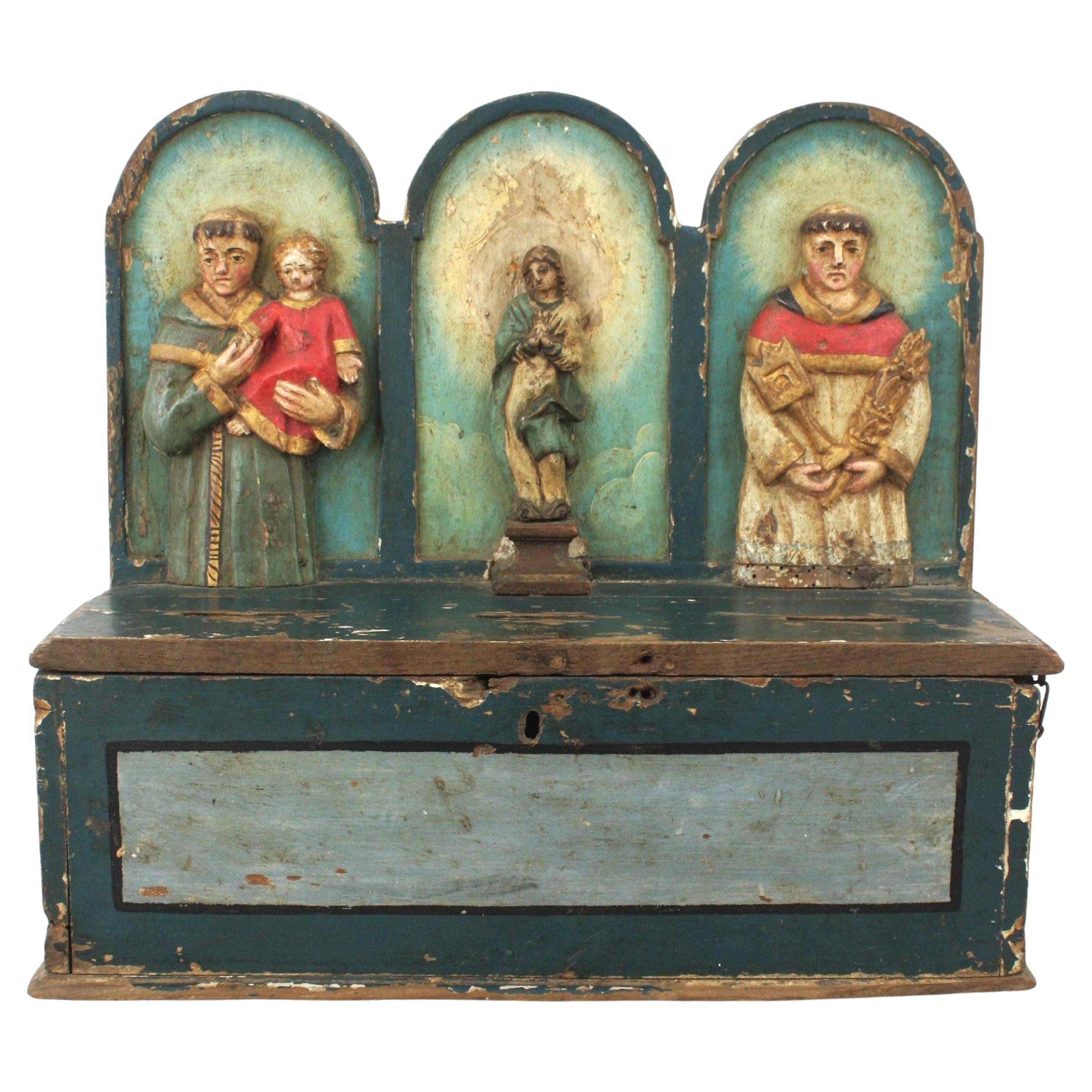 Cassetta delle elemosine spagnola / Decorazione da parete con dettagli di santi intagliati, XVIII secolo