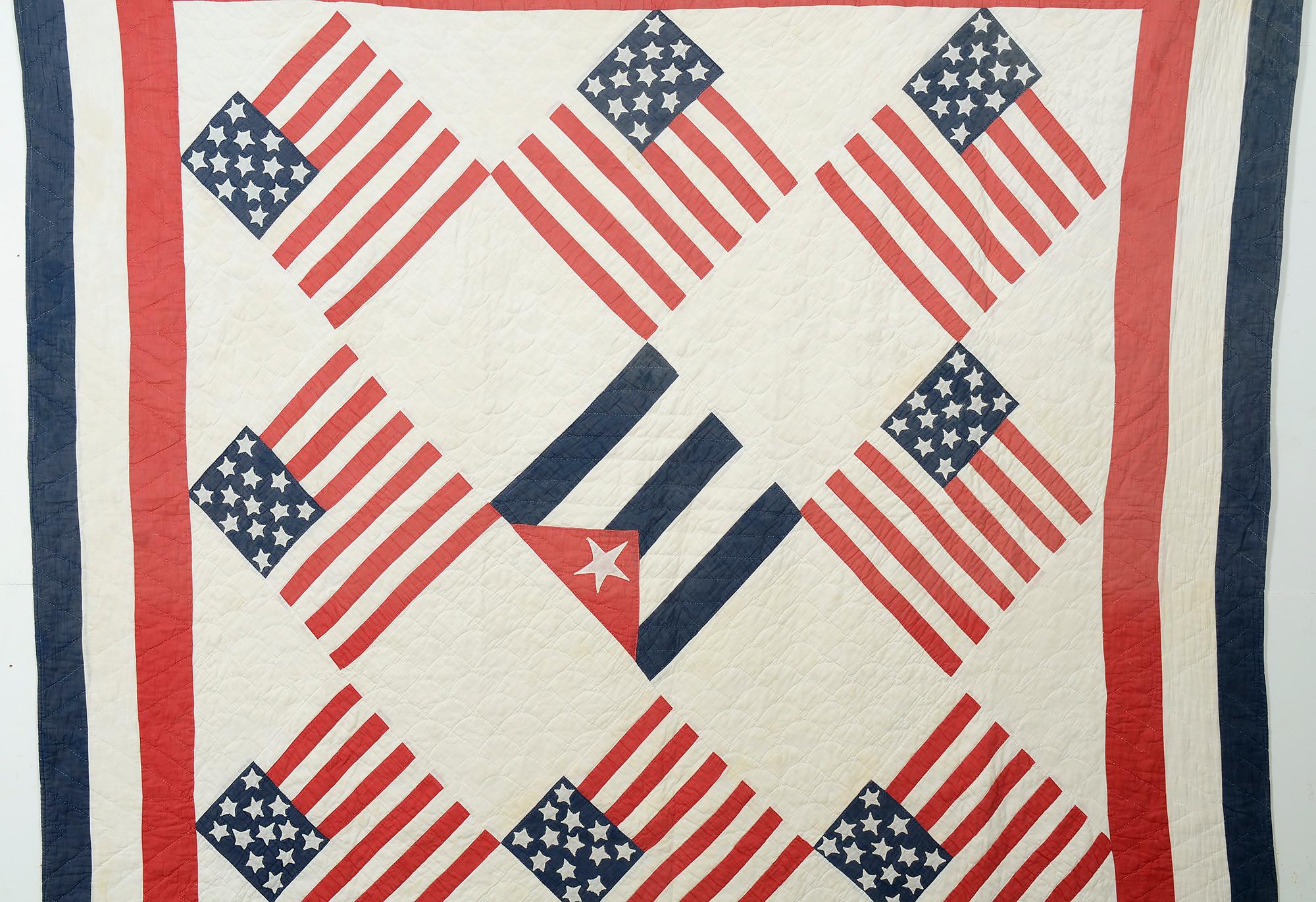 This patriotic quilt was made to commemorate the Spanish American War that took place for 10 weeks in 1898. The main issue was Cuban independence from Spain. Revolts had been occurring for some years in Cuba against Spanish colonial rule. Spain