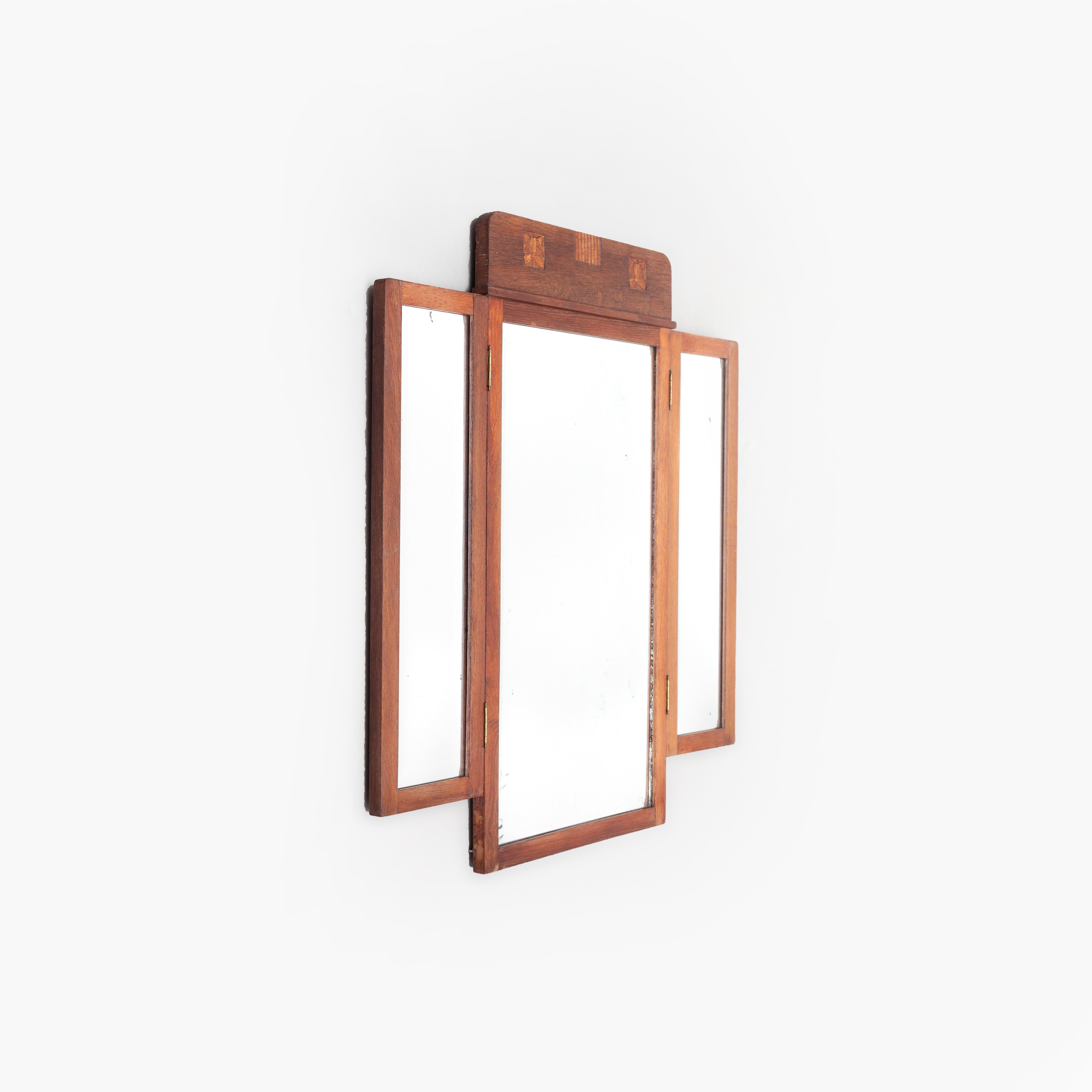 Handcrafted Art-Deco mirror made in Spain, circa 1920
Oak wood.

In original condition, with minor wear consistent of age and use, preserving a beautiful patina.