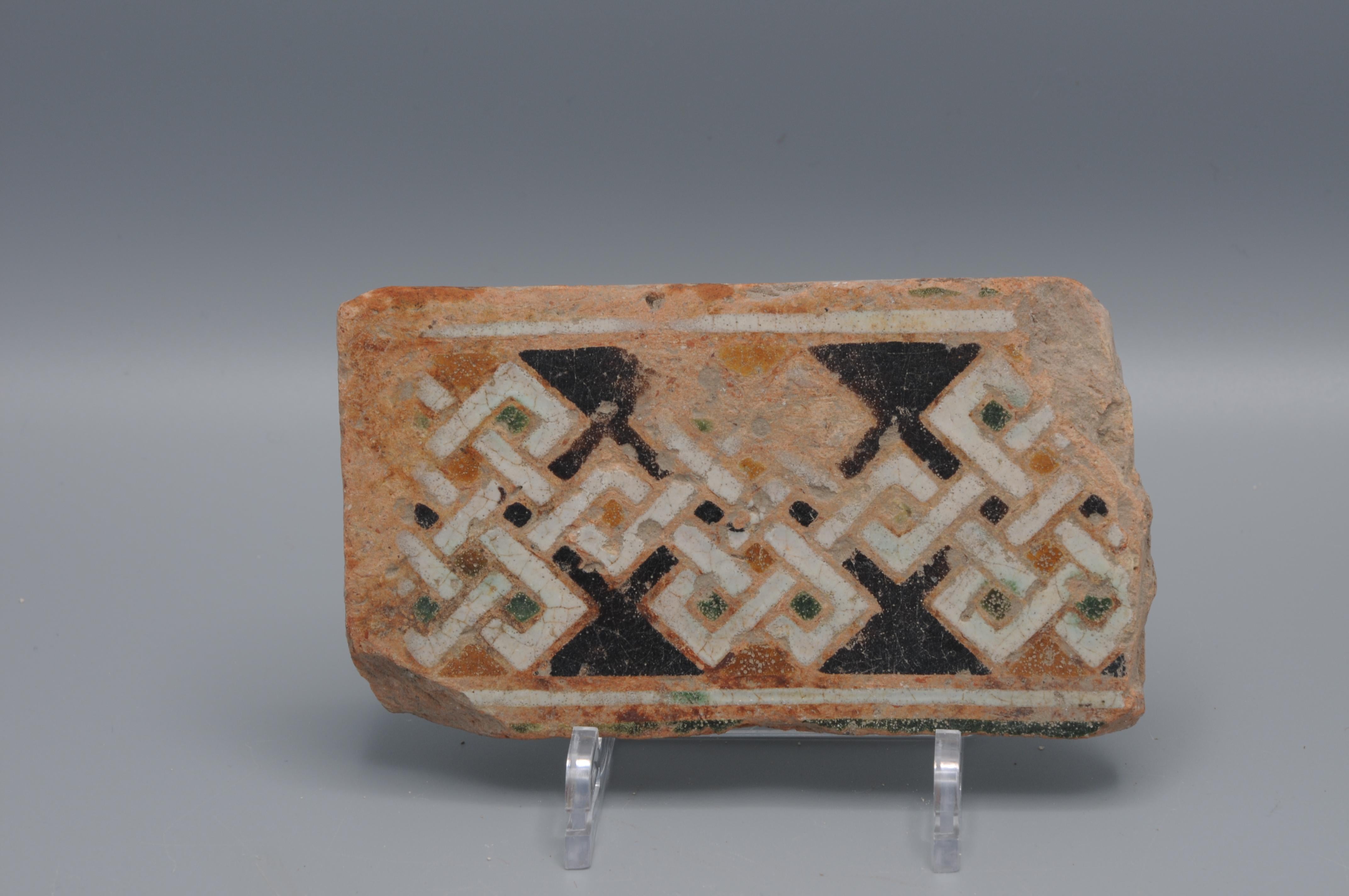 Early Arabe / Mudejar style tile with geometric decoration, made late 15th century.

