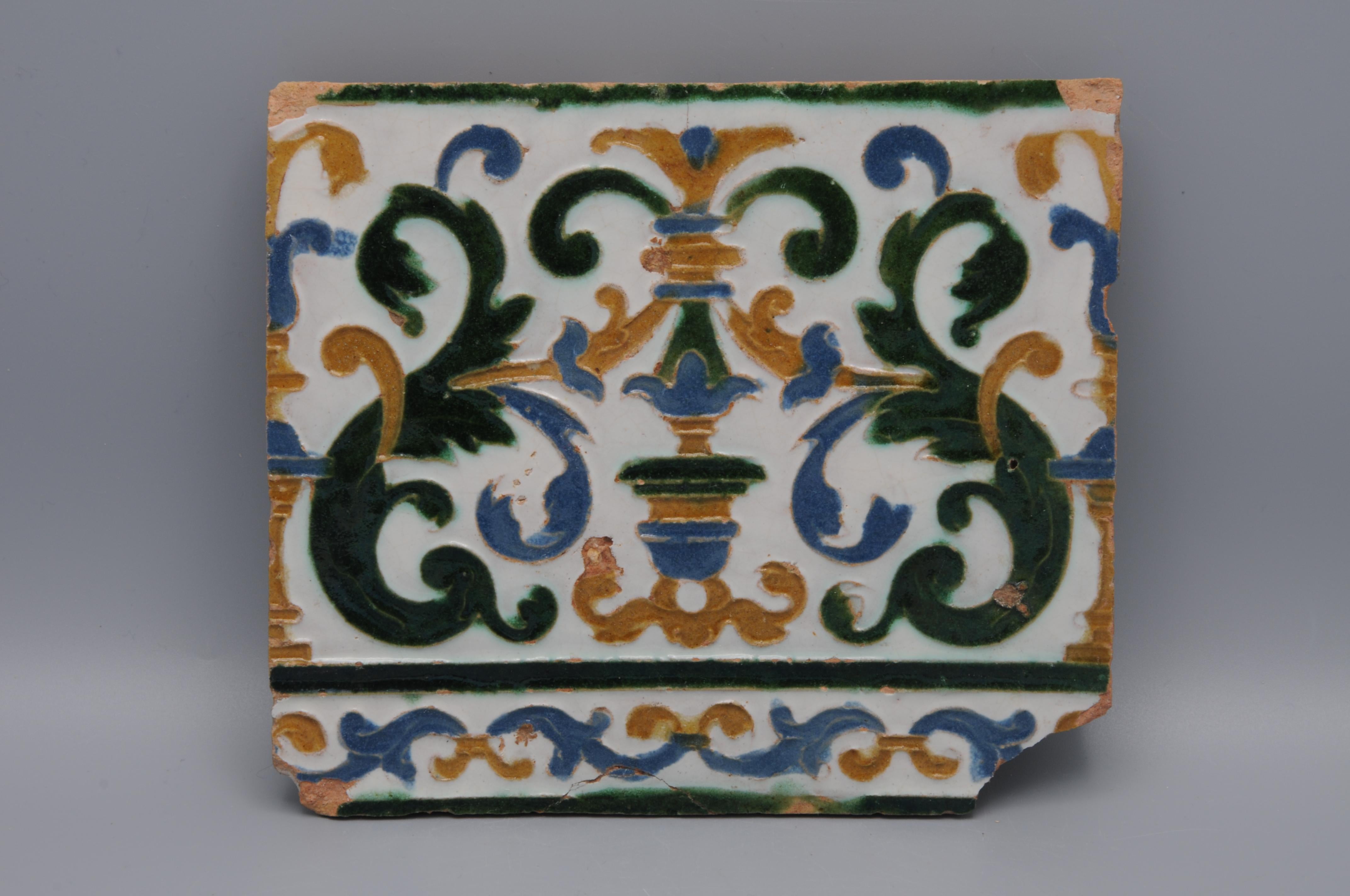 Spanish Arista Tile Fragment, Toledo, mid-16th Century (c. 1550–1575)

This tin-glazed earthenware tile fragment originates from Toledo, Spain, dated to circa 1550–1575. The ceramic employs the arista (cuenca) technique—molded and impressed in soft