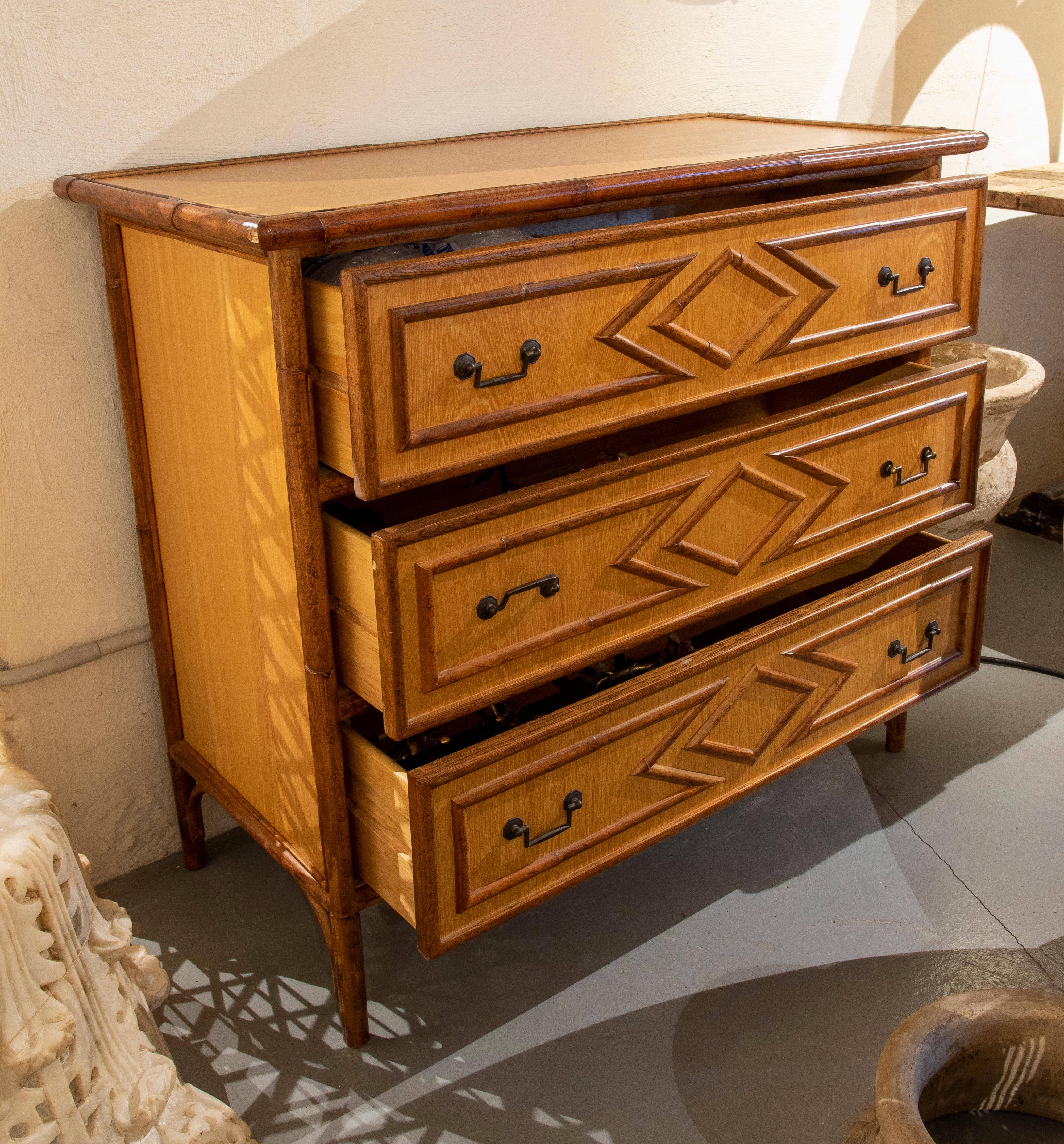 Spanish Bamboo and Wood chest of drawers with three drawers and Bronze Pulls.