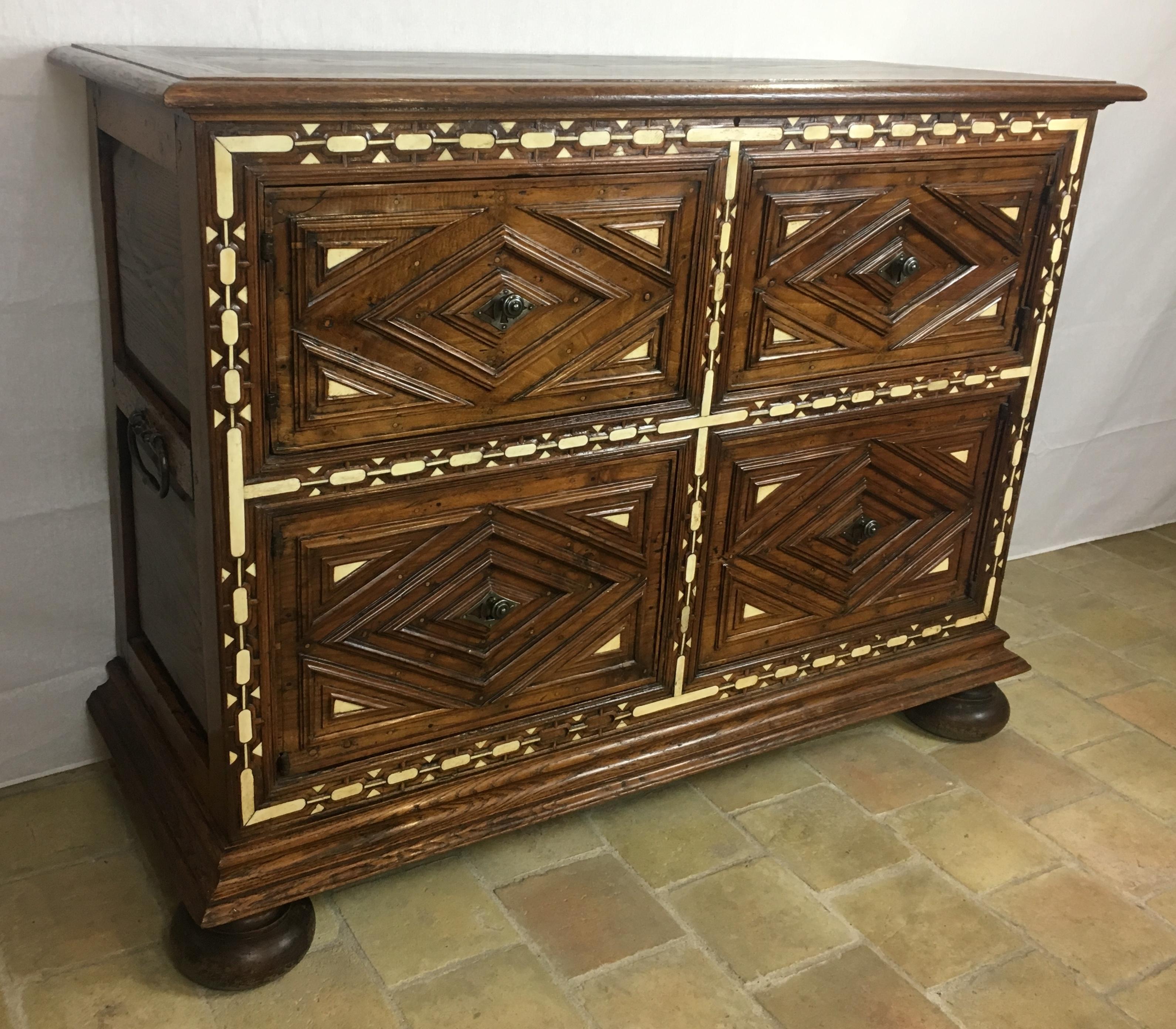 A stunning late 17th-early 18th century Spanish Bargueno chest with bone inlay, Varguen~o. 

Provenance the estate of Former French President Sadi Carnot.

This beautiful chest with arcaded and geometric molded ornament on block feet has wonderful