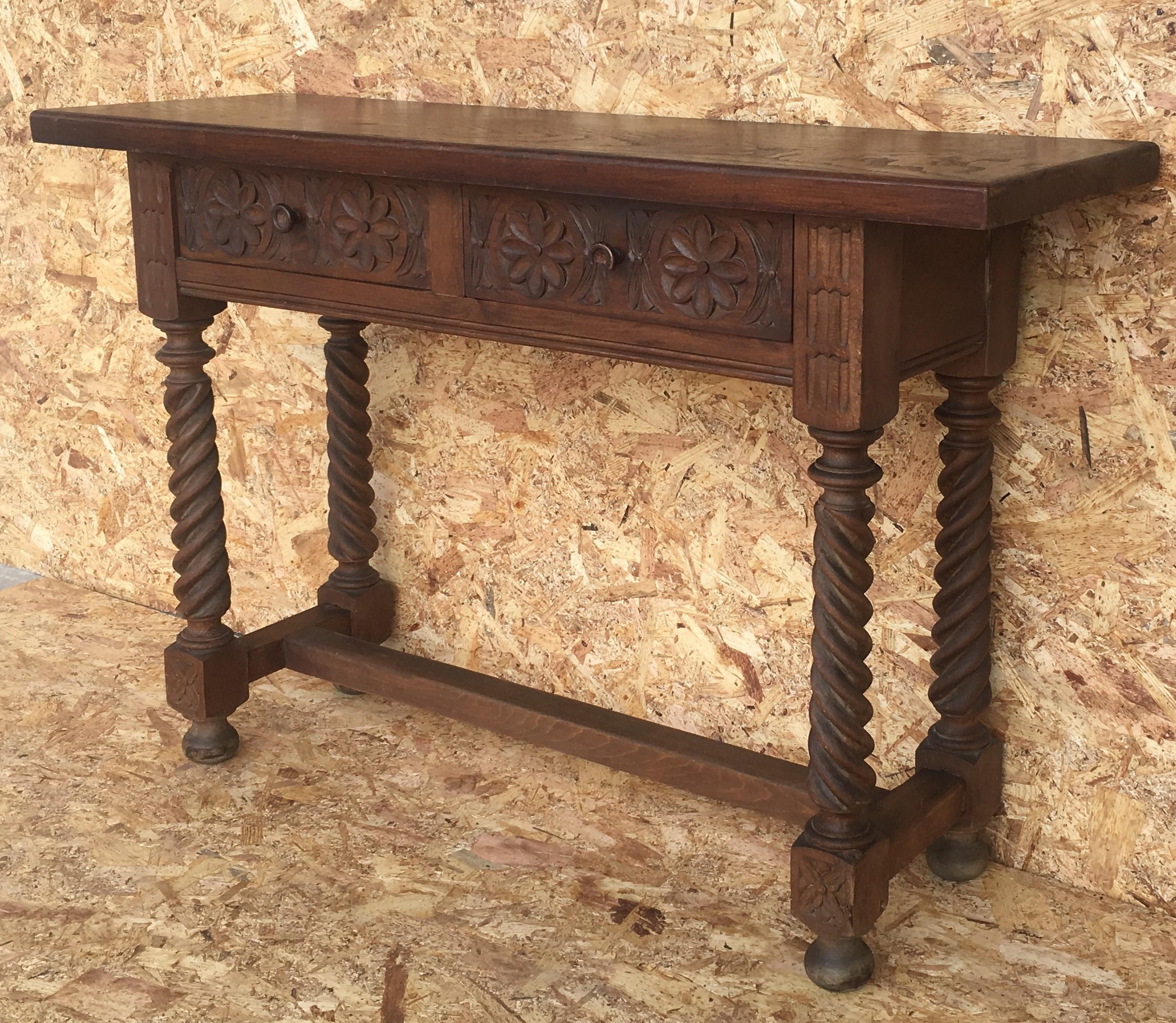 Spanish baroque carved walnut console table with two drawers, circa 1860.