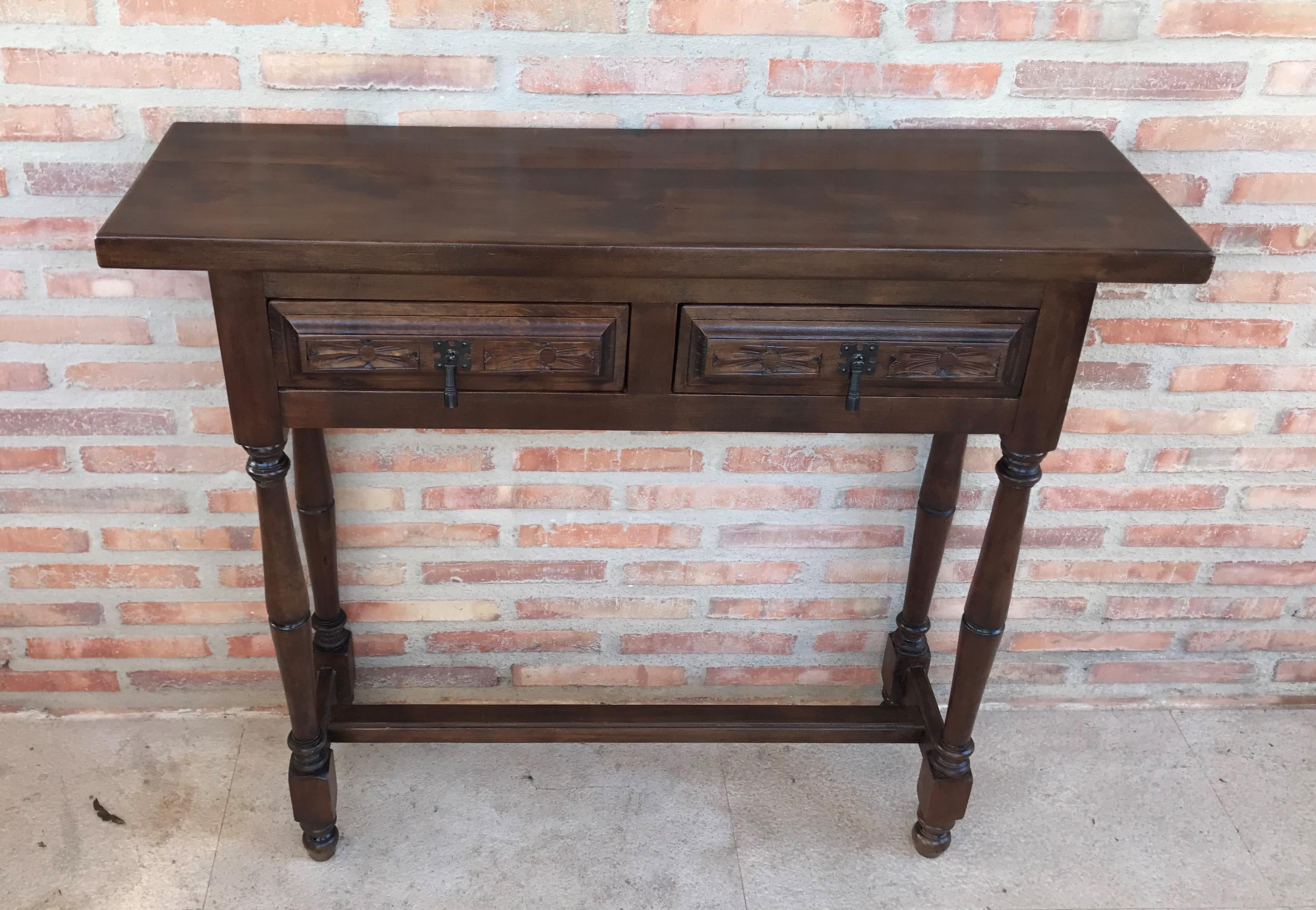 Spanish Baroque carved walnut console table with two drawers, circa 1890.