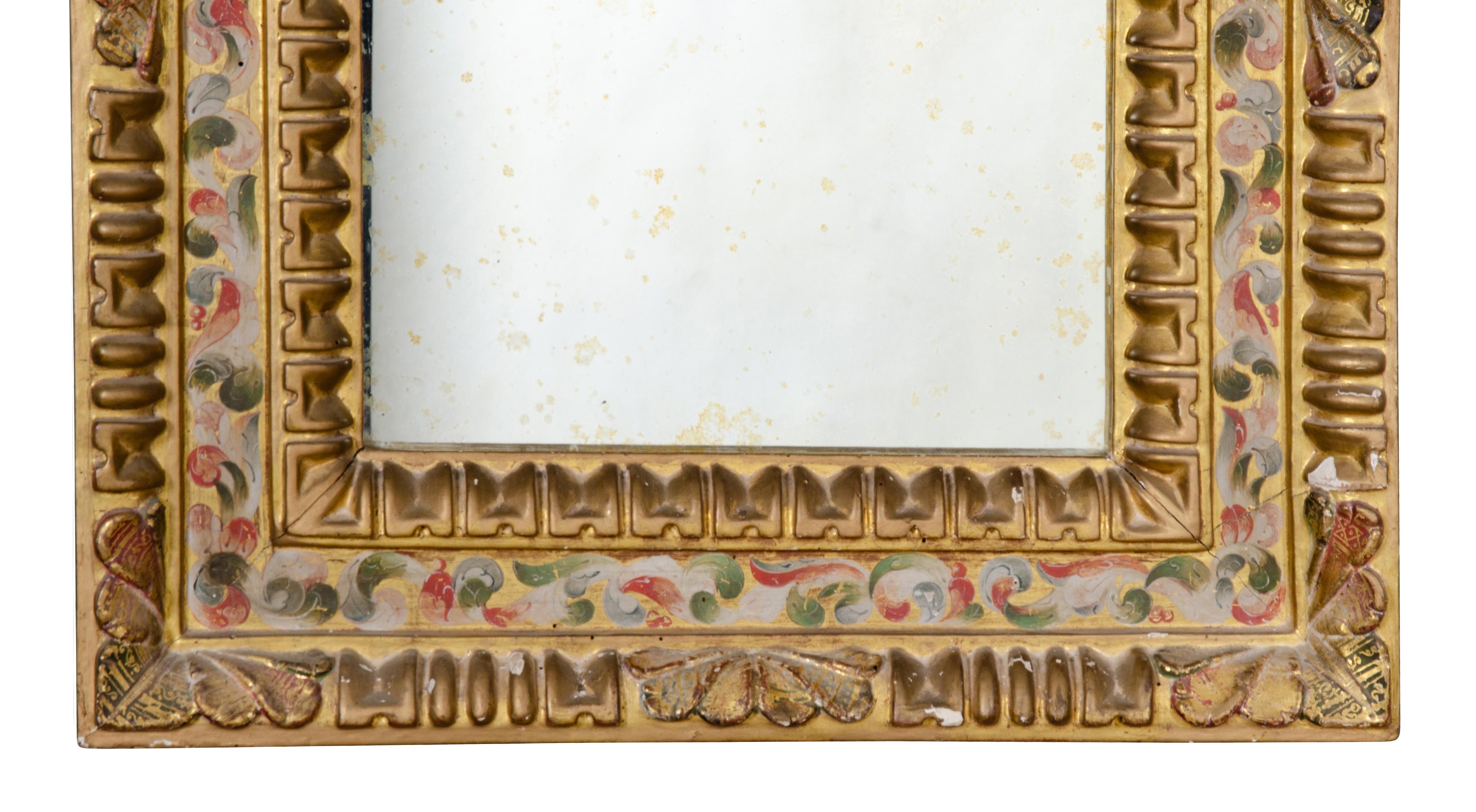 Rectangular with nice carved and gilded and painted detail.