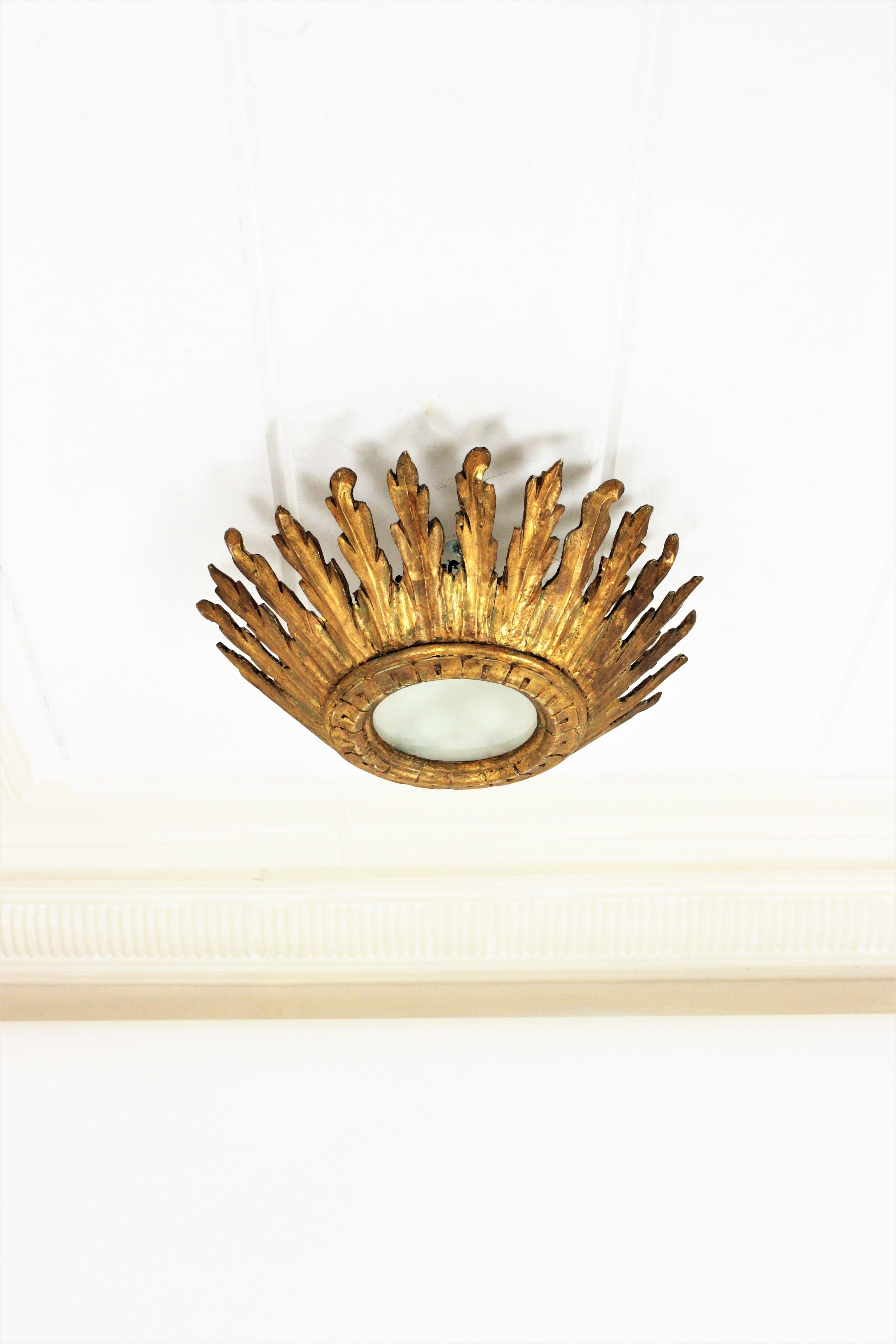 Carved Sunburst Crown Ceiling Flush Mount Light Fixture in Giltwood, Spanish Baroque For Sale