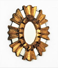 Spanish Baroque Mini Sunburst Oval Mirror in Giltwood, 1940s