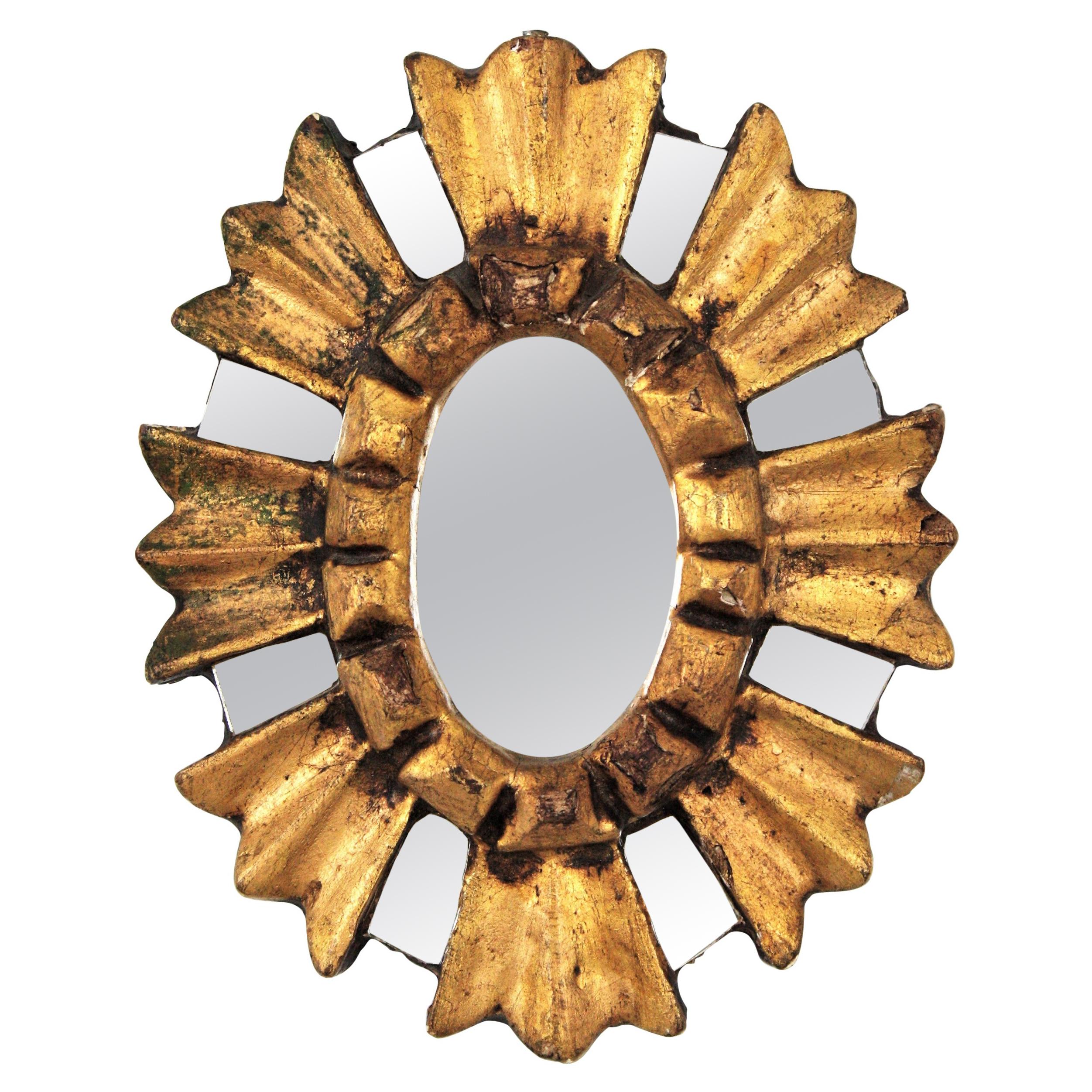 Mini miroir ovale baroque espagnol en bois doré Sunburst