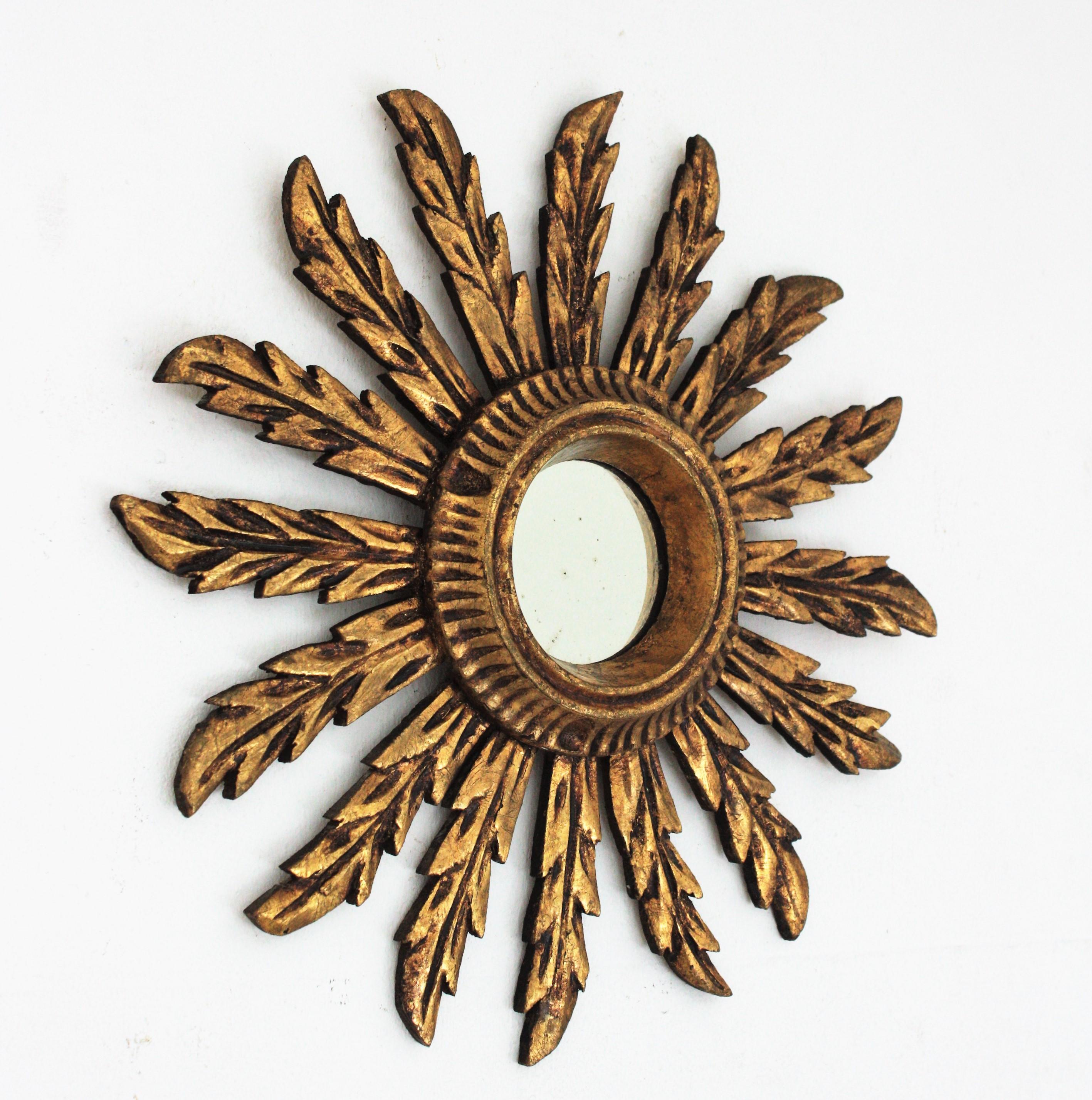 Carved Spanish Baroque Giltwood Sunburst Mirror For Sale