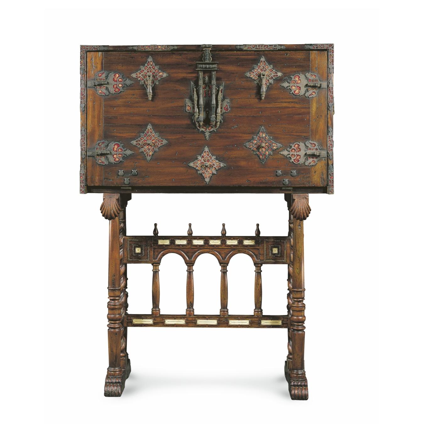 The Bargueño was originally developed as a traveling desk in the Spanish Baroque. Although it is a totally appropriate piece for traditional decorations and settings, it has been used successfully as a contrast element in modern environments. It is