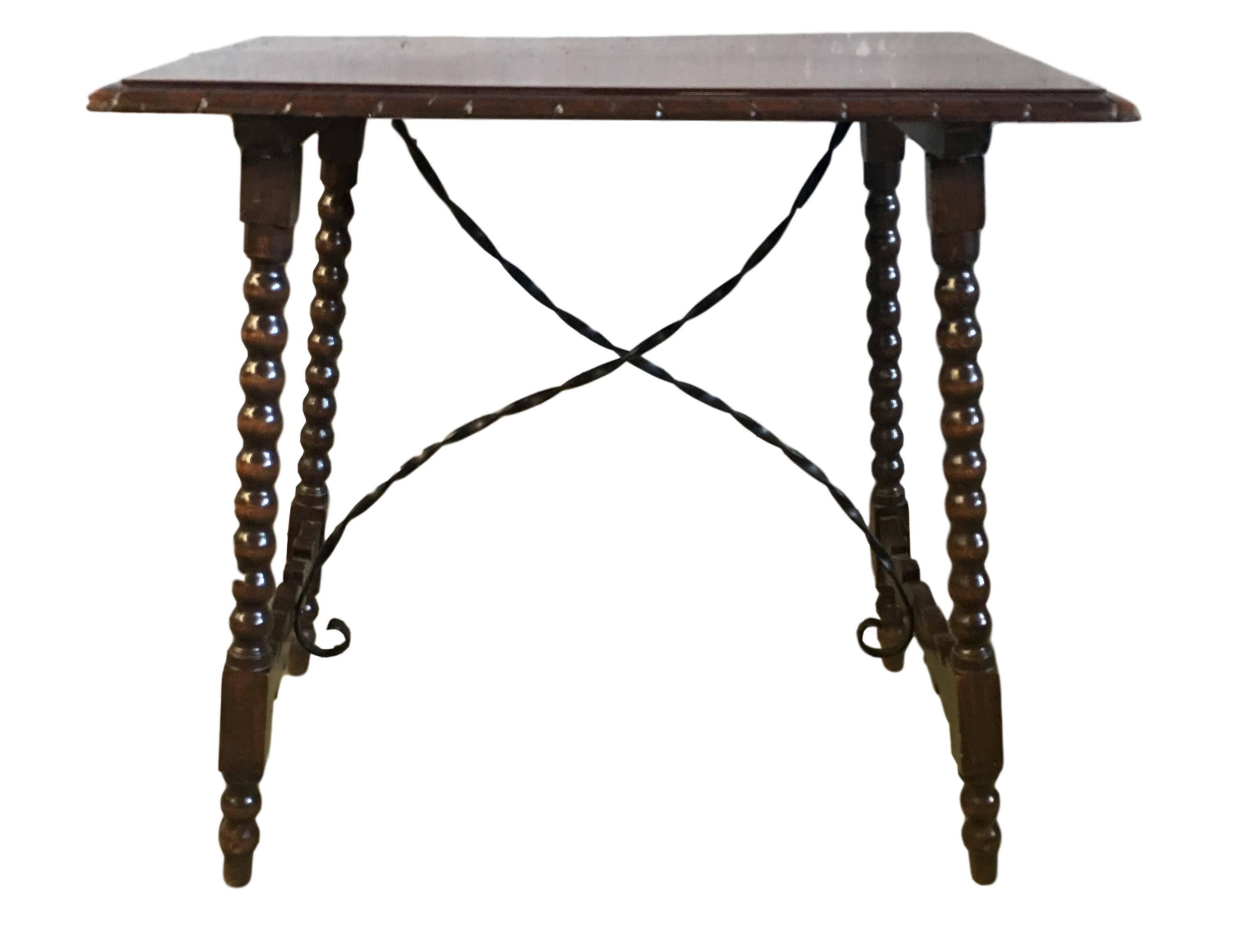 Spanish Baroque Side Table with Iron Stretcher and Carved Top in Walnut In Excellent Condition In Miami, FL