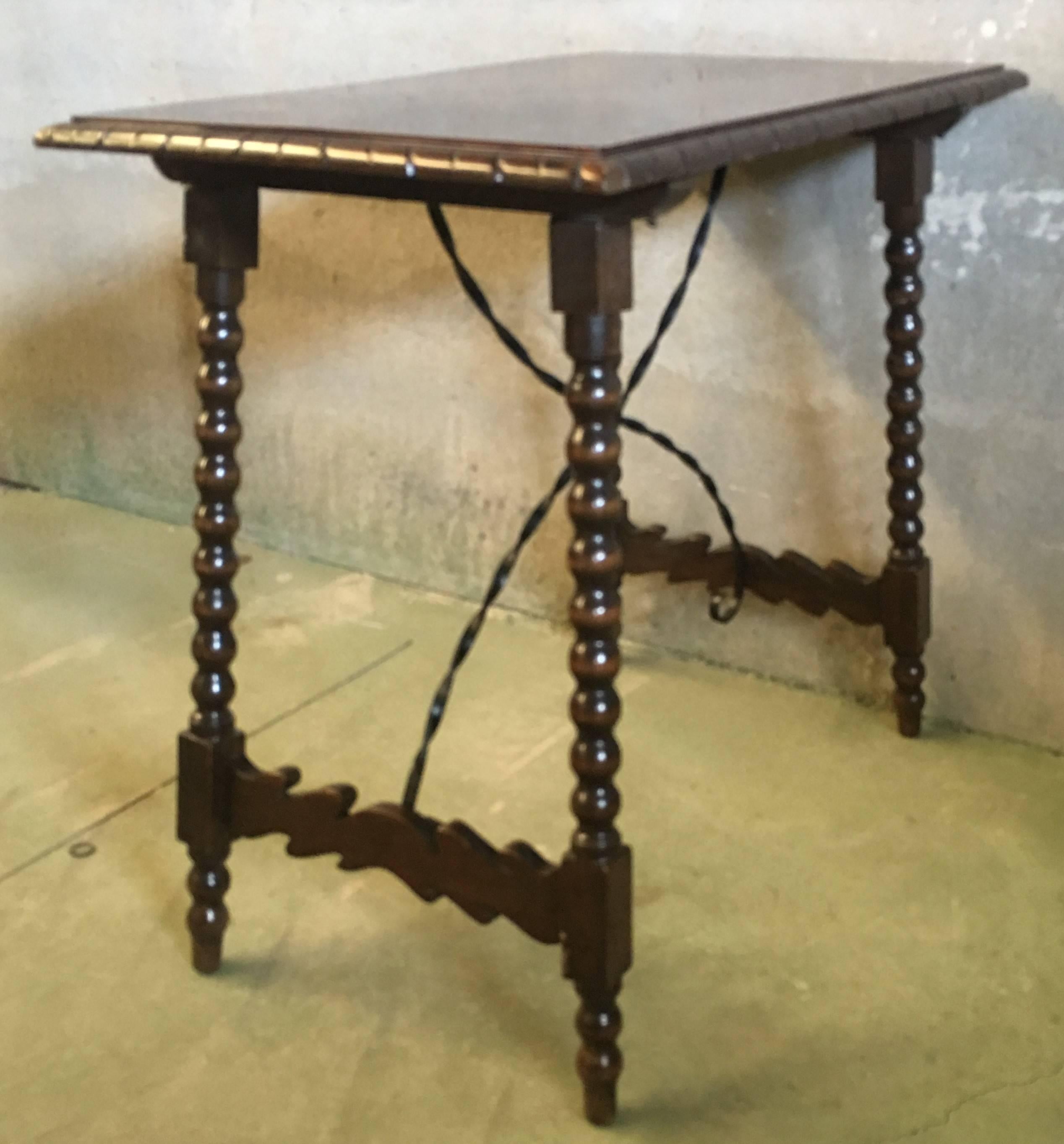Spanish Baroque Side Table with Iron Stretcher and Carved Top in Walnut 1