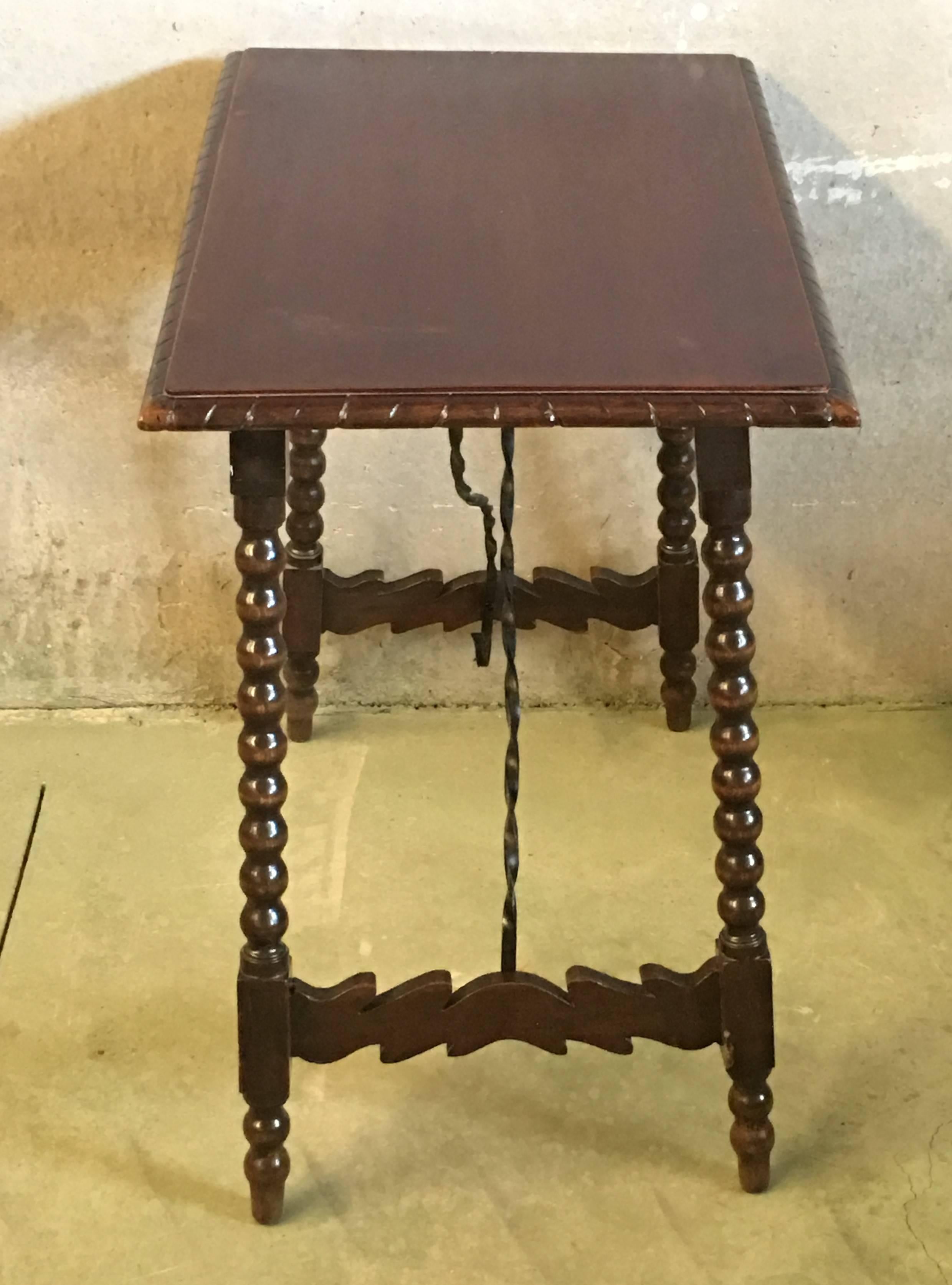 Spanish Baroque Side Table with Iron Stretcher and Carved Top in Walnut 2