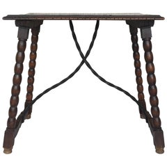 Spanish Baroque Side Table with Iron Stretcher and Carved Top in Walnut Spanish Baroque Side Table with Iron Stretcher and Carved Top in Walnut