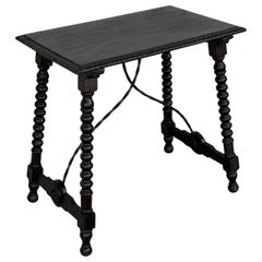 Spanish Baroque Side Table with Iron Stretcher and Carved Top in Walnut