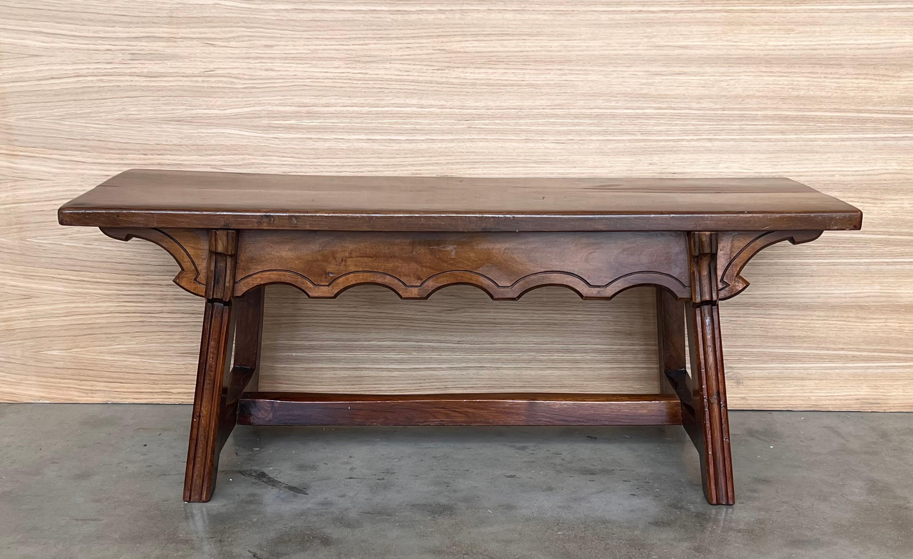 19th Century Spanish Baroque ebonized side or working table with wood stretcher and top in walnut.
We have a matching smaller coffee table, you can see it in the last picture.