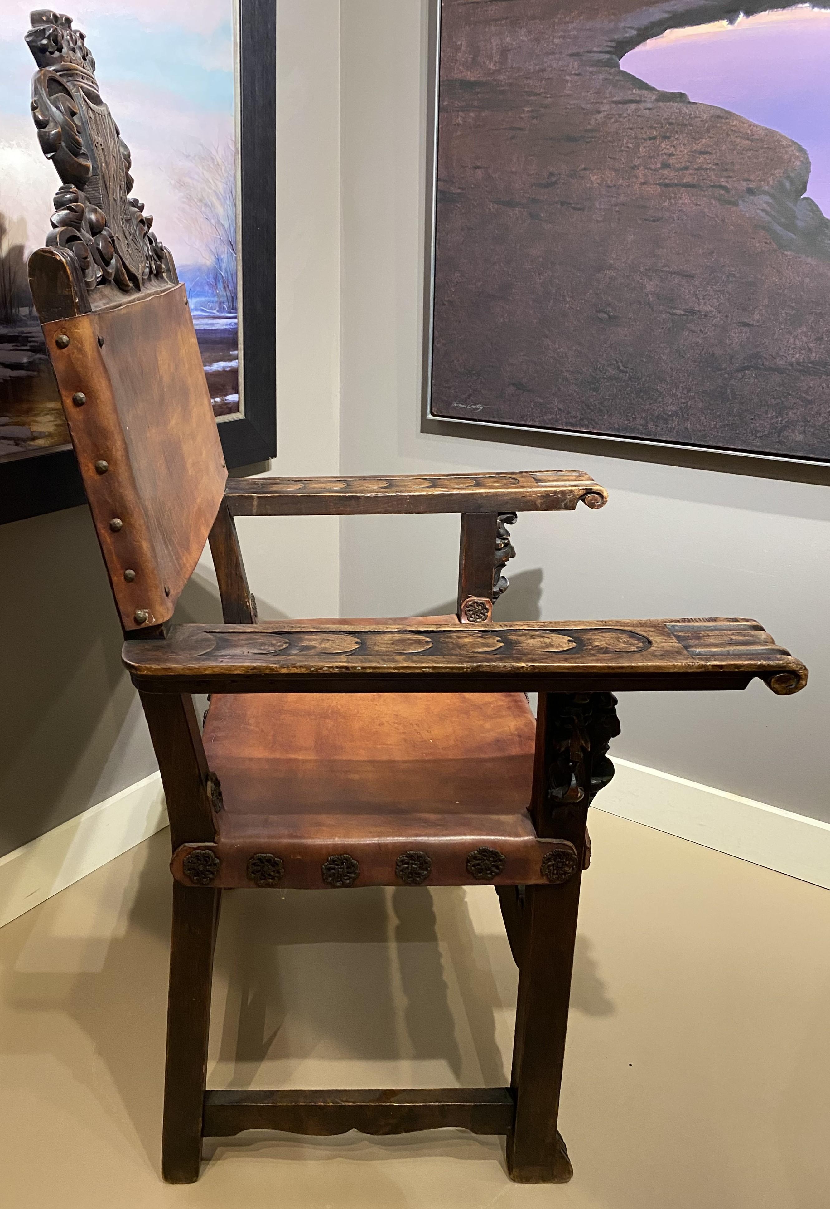 20th Century Spanish Baroque Style Carved Oak & Leather Armchair For Sale