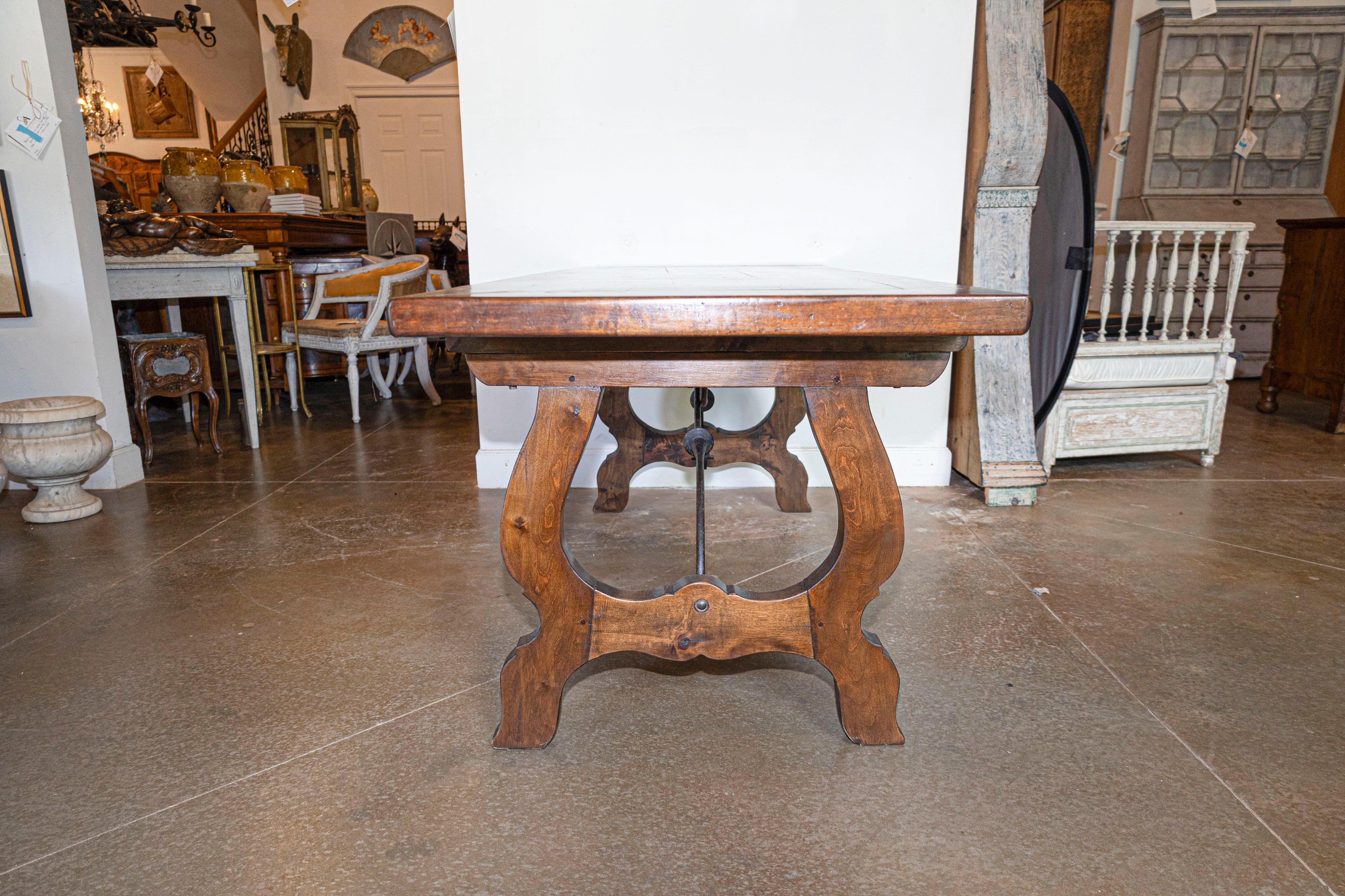 20th Century Spanish Baroque Style Fratino Table with Lyre Shaped Base and Iron Stretcher
