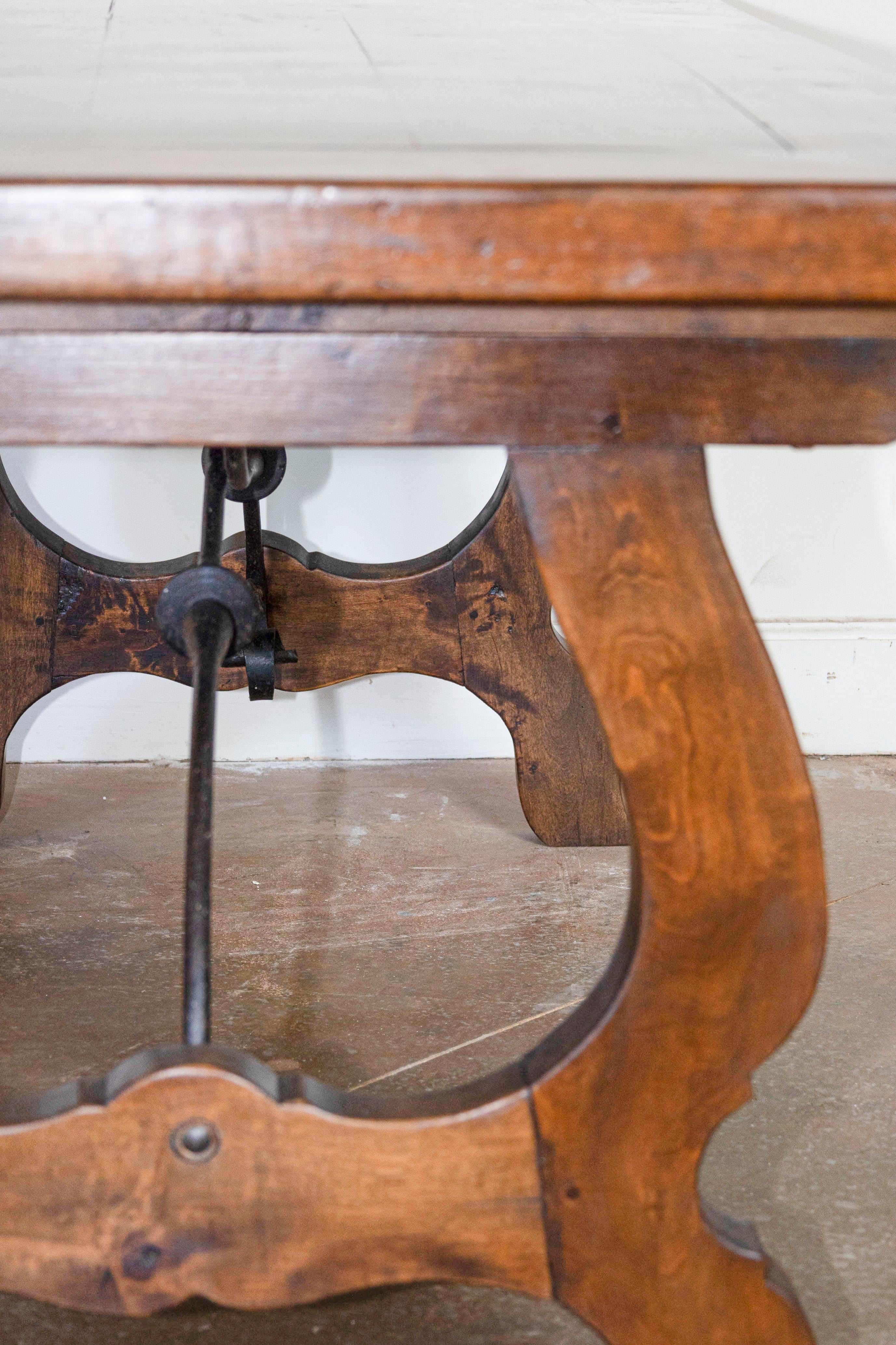 Spanish Baroque Style Fratino Table with Lyre Shaped Base and Iron Stretcher 1