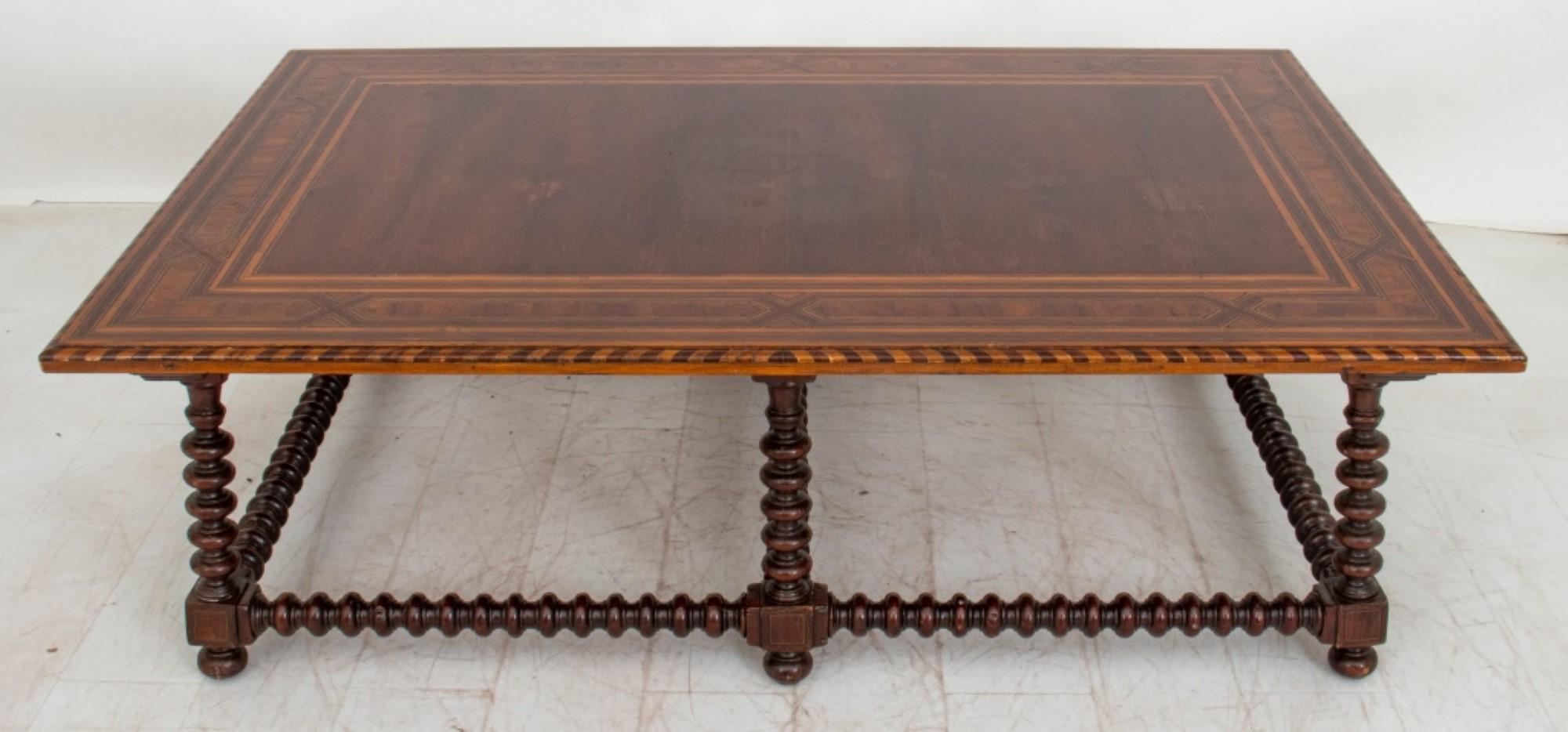 The Spanish Baroque style low table with parquetry inlaid rectangular top, Made in Mexico in the 20th Century. It features characteristics of Spanish Baroque style, Mexican furniture, Hispano-Mauresque, Spanish Colonial style, and Latin American