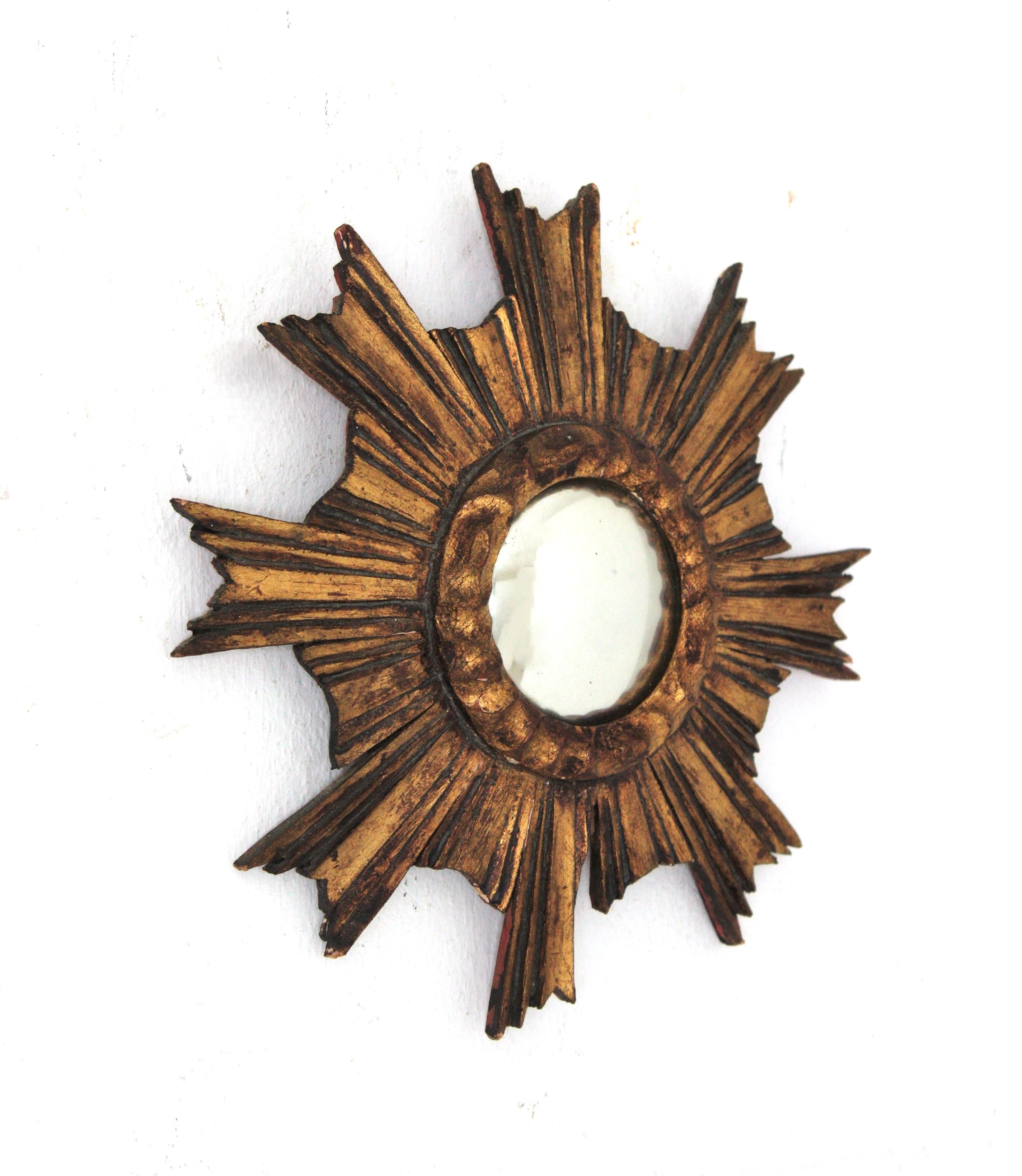 Hand-Carved Spanish Baroque Sunburst Giltwood Convex Mirror in Small Scale