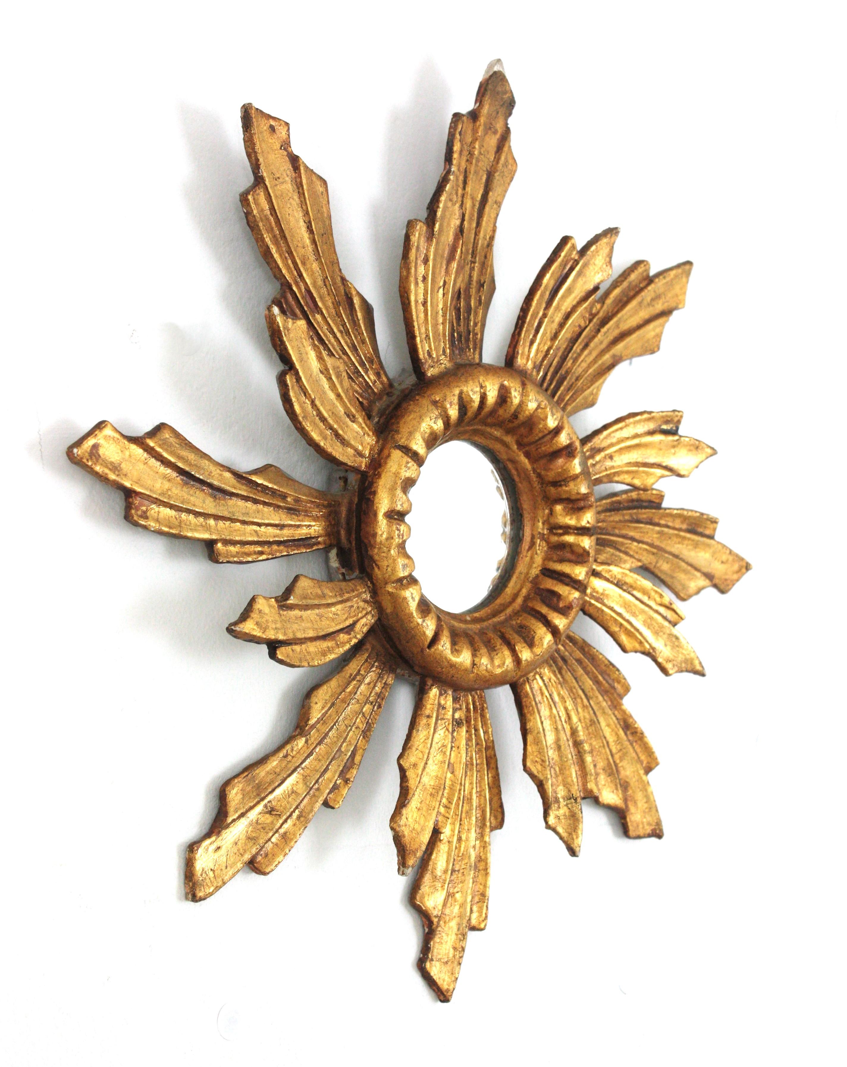 20th Century Spanish Baroque Sunburst Mirror in Carved Giltwood For Sale