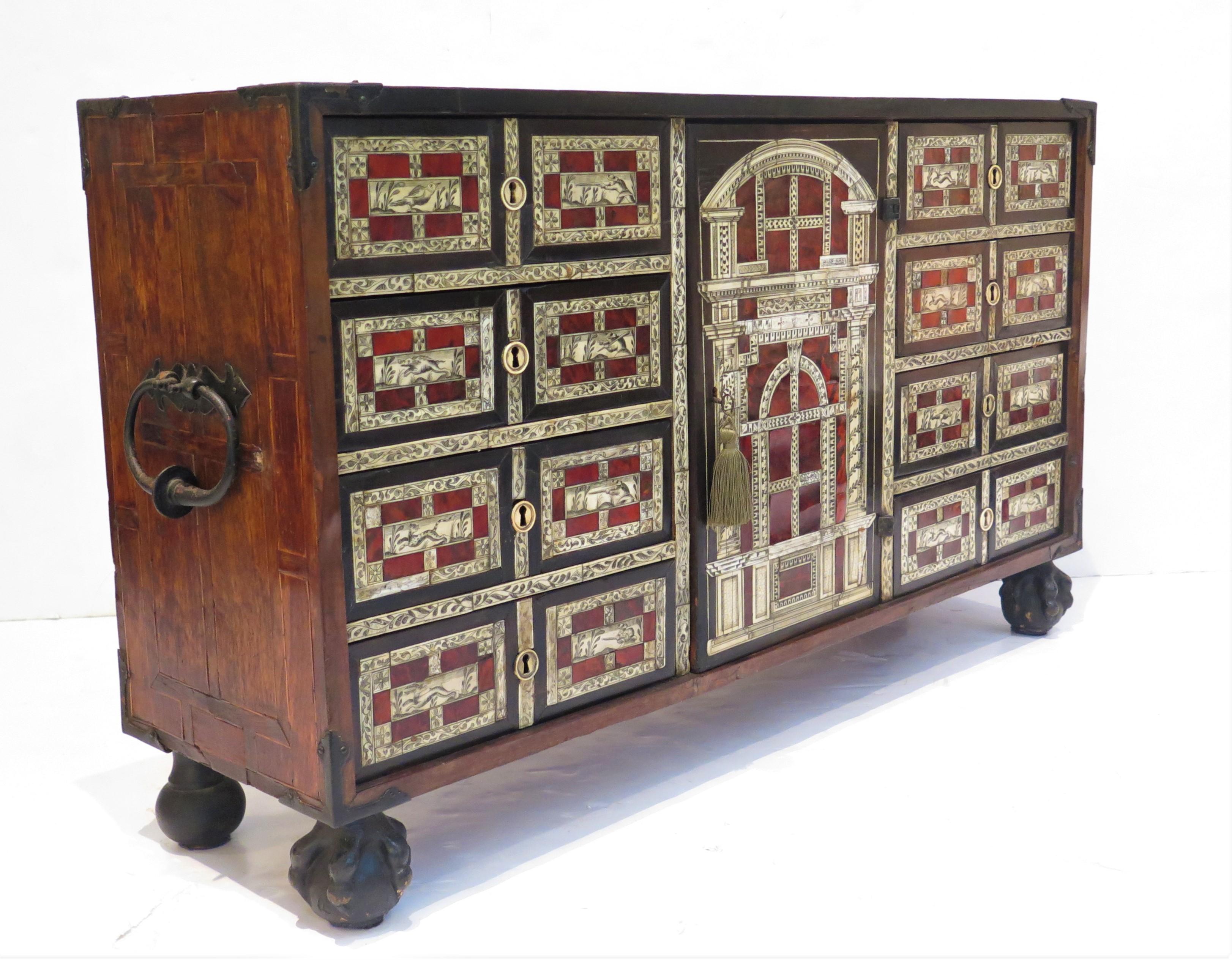 Spanish Baroque walnut vargueño / collectors cabinet / traveling table cabinet with highly detailed / decorated bone inlay and trim, wrought iron mounted, Spain, late 17th century  