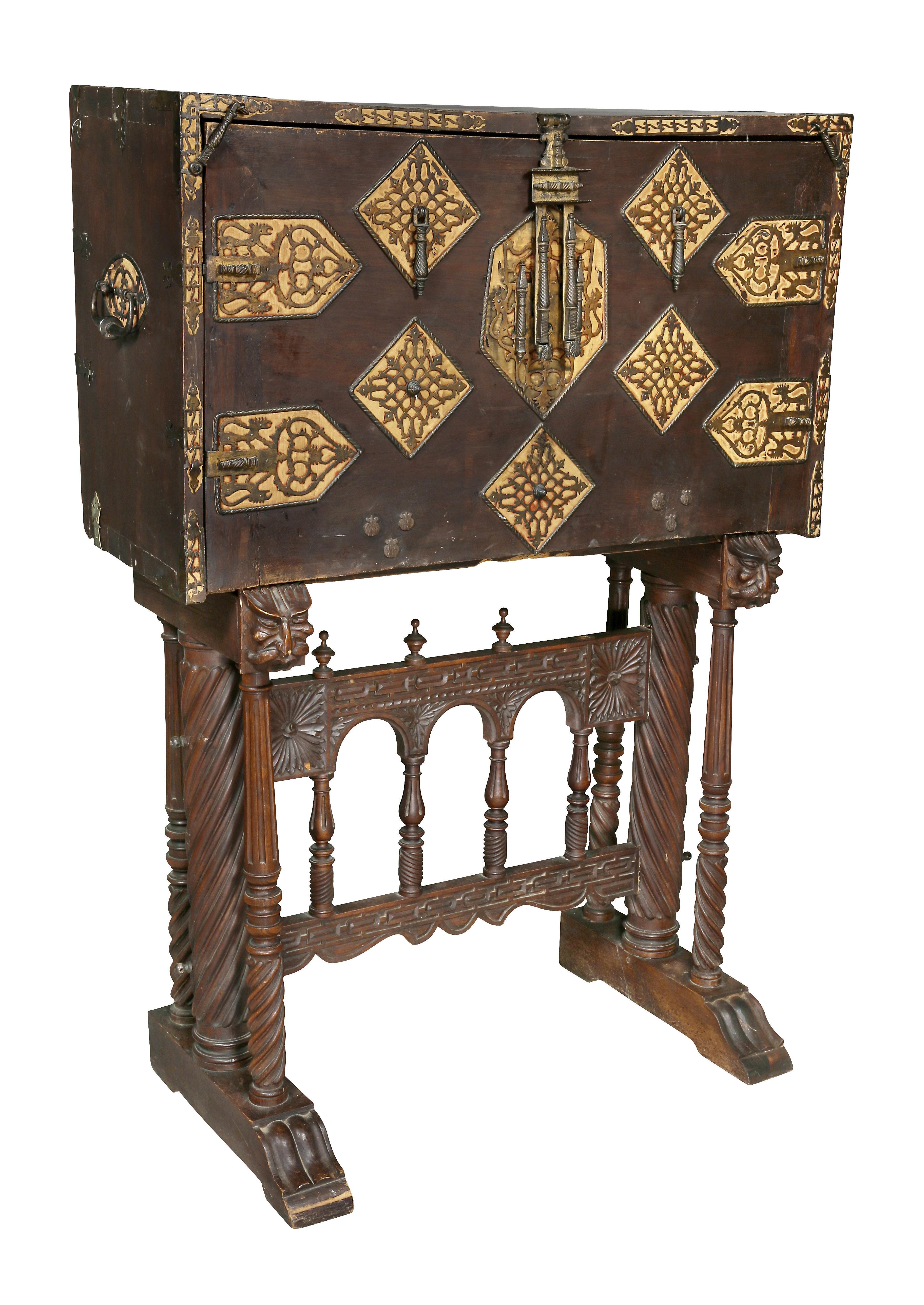 The top 17th century and the base 19th century. With fold down lid opening to a giltwood interior with an array of doors and drawers. The carved base with pullout / pull-out lid supports, arcaded stretcher and shoe feet. Purchased Sothebys for