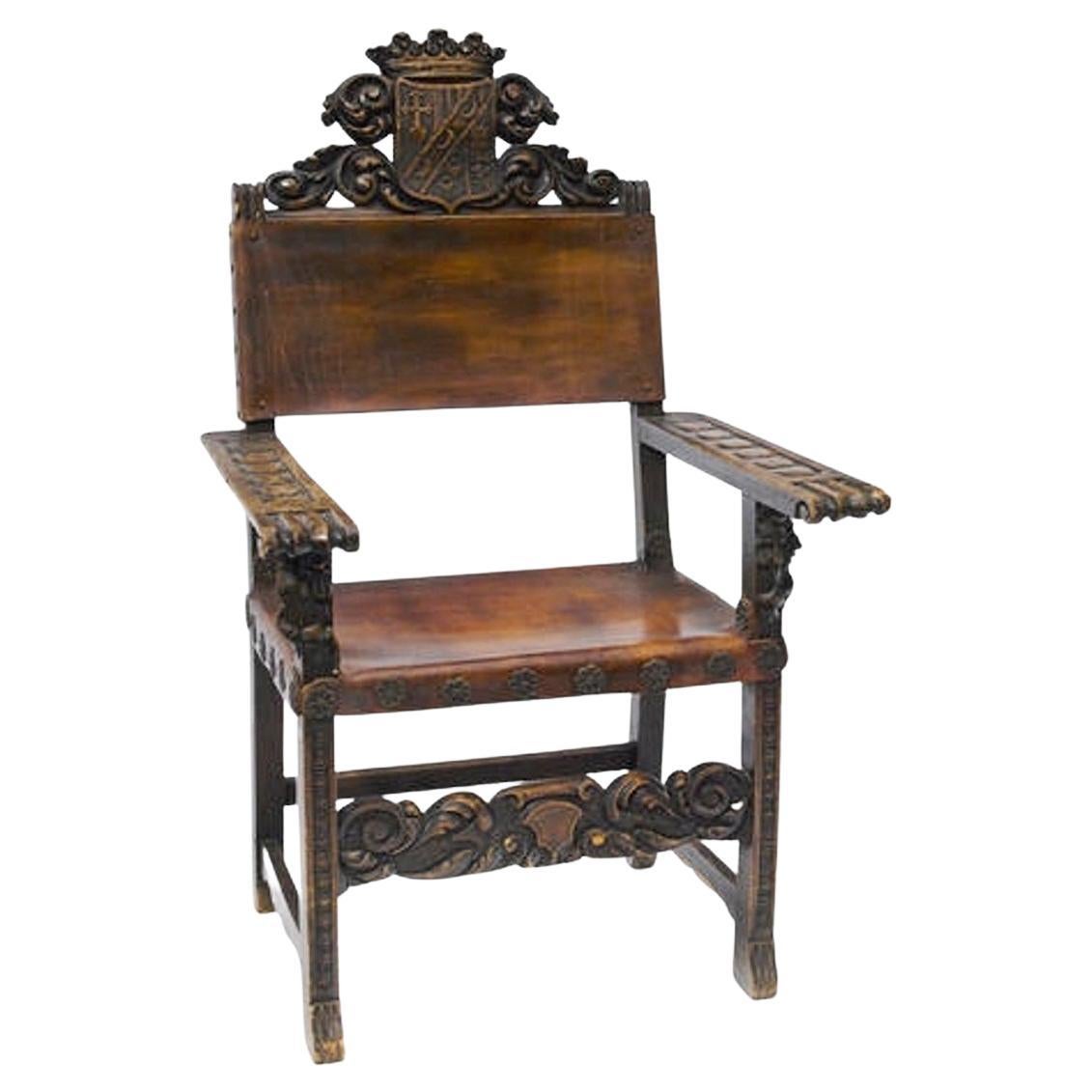 Spanish Baroque walnut armchair with crown and coat of arm, Early 19c   For Sale