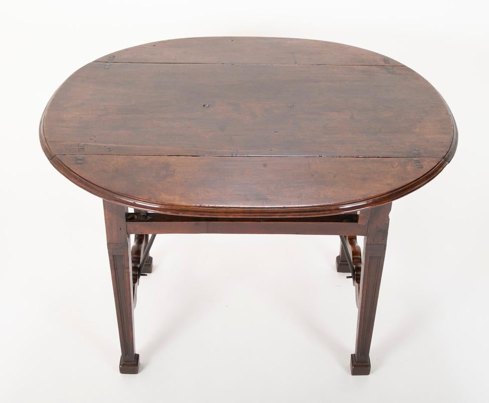 18th Century Spanish Baroque Walnut Drop Leaf Table with Wrought Iron Stretchers For Sale