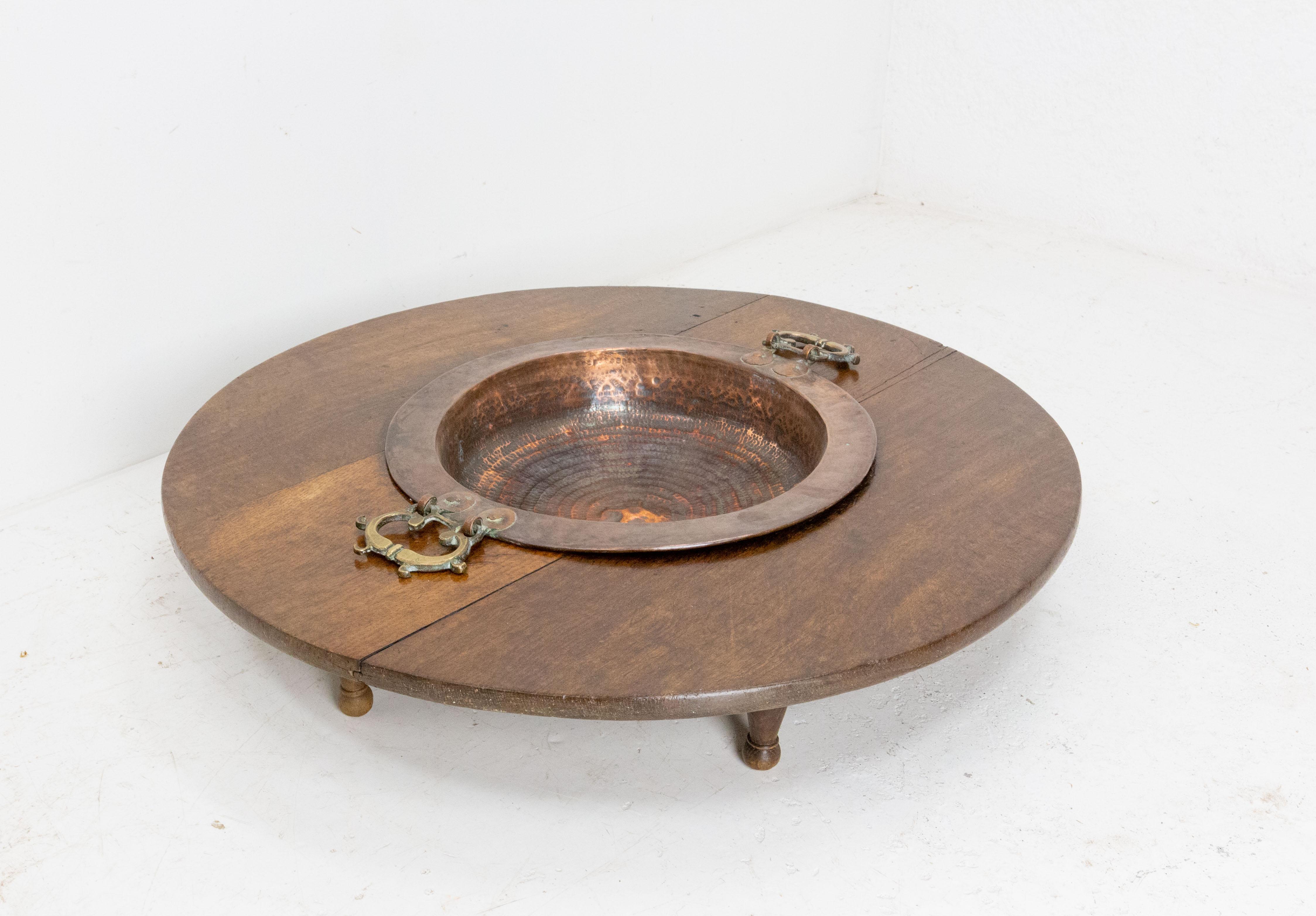 19th century Basque Spanish brasero
The oak part is a tank in which people used to put hot water. On the top copper part were put embers to keep the water hot. This kind of brasero were put under the table to warm up the feet and the legs of the