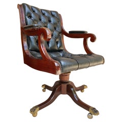 Spanish Black Leather Armchair in Mahogany with Wheels, 1930s