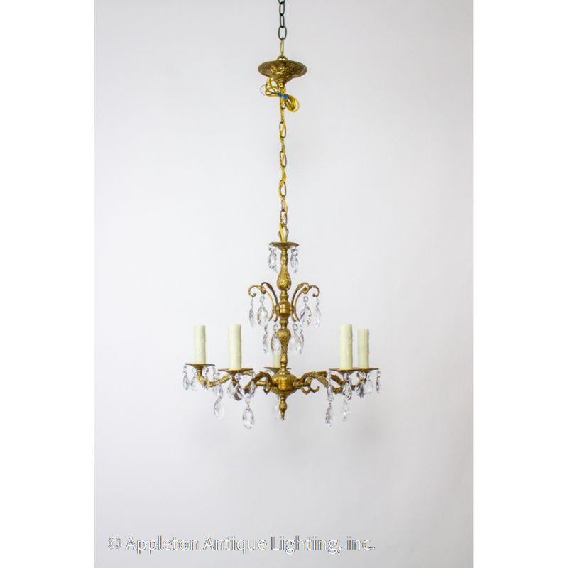 Mid 20th Century Spanish brass and crystal chandelier. Solid brass with light patina. Five arms. Teardrop crystals.



Material: brass, crystal
Style: Traditional, Hollywood Regency
Place of Origin: Spain
Period made: mid 20th century
Dimensions: