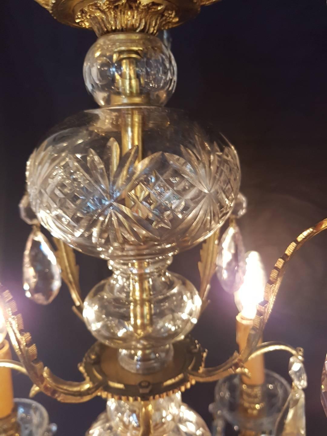 Mid-20th Century Spanish Bronze and Crystal Chandelier For Sale