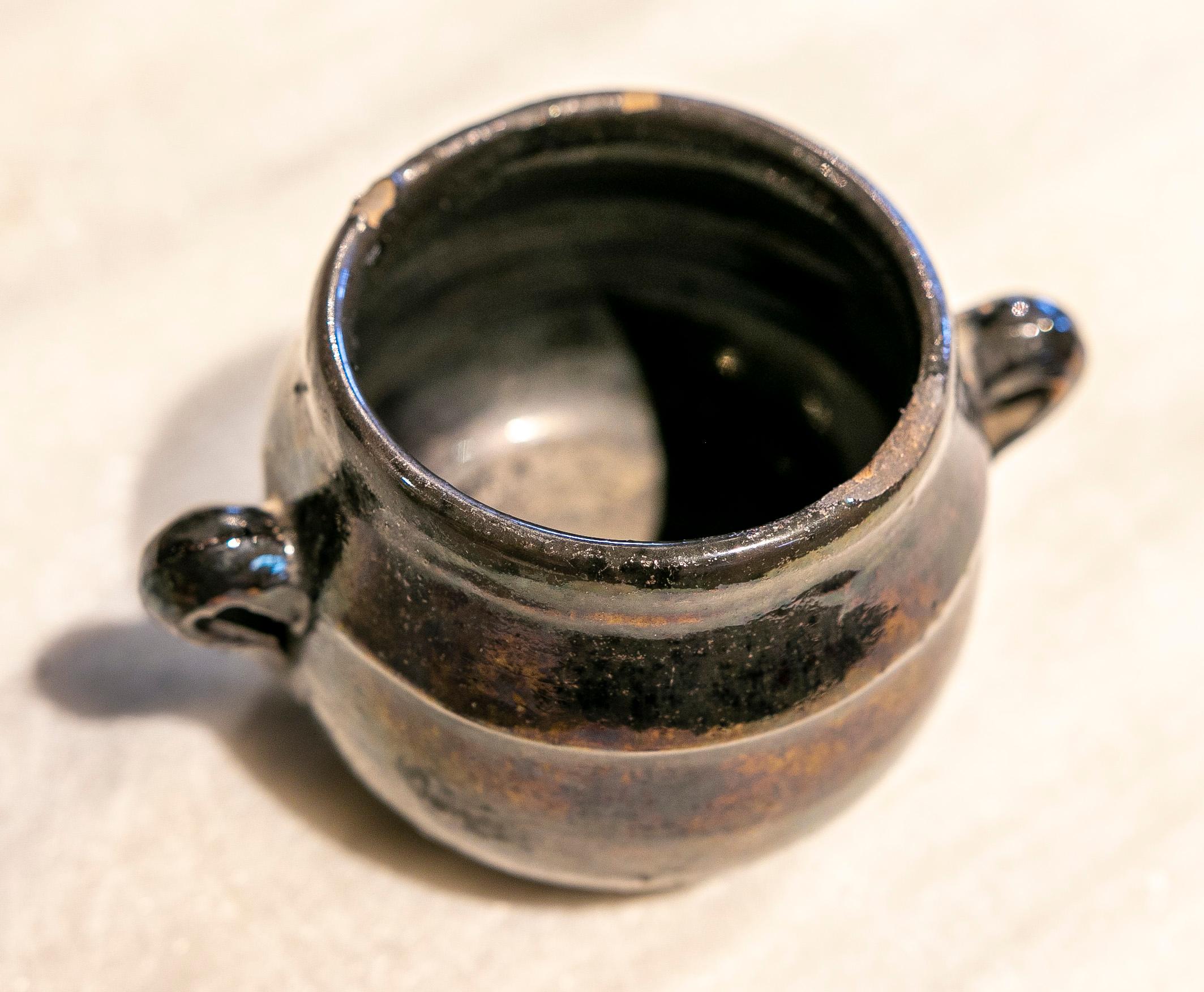 Spanish brown glazed earthenware casserole.