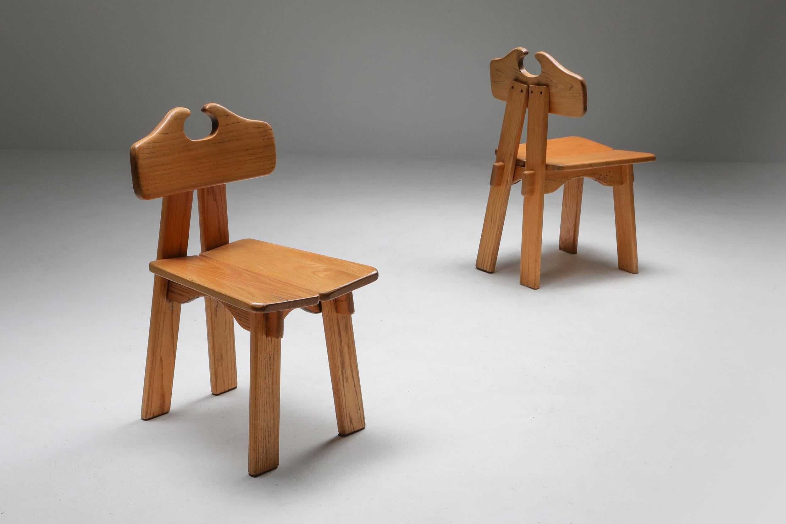 Brutalist dining chair, Spain, 1970s, style Pierre Chapo
Like a robust version of a Pierre Chapo chair. 
This playful Brutalist set of four chairs has quite some charm to it, Spain, 1970s

 