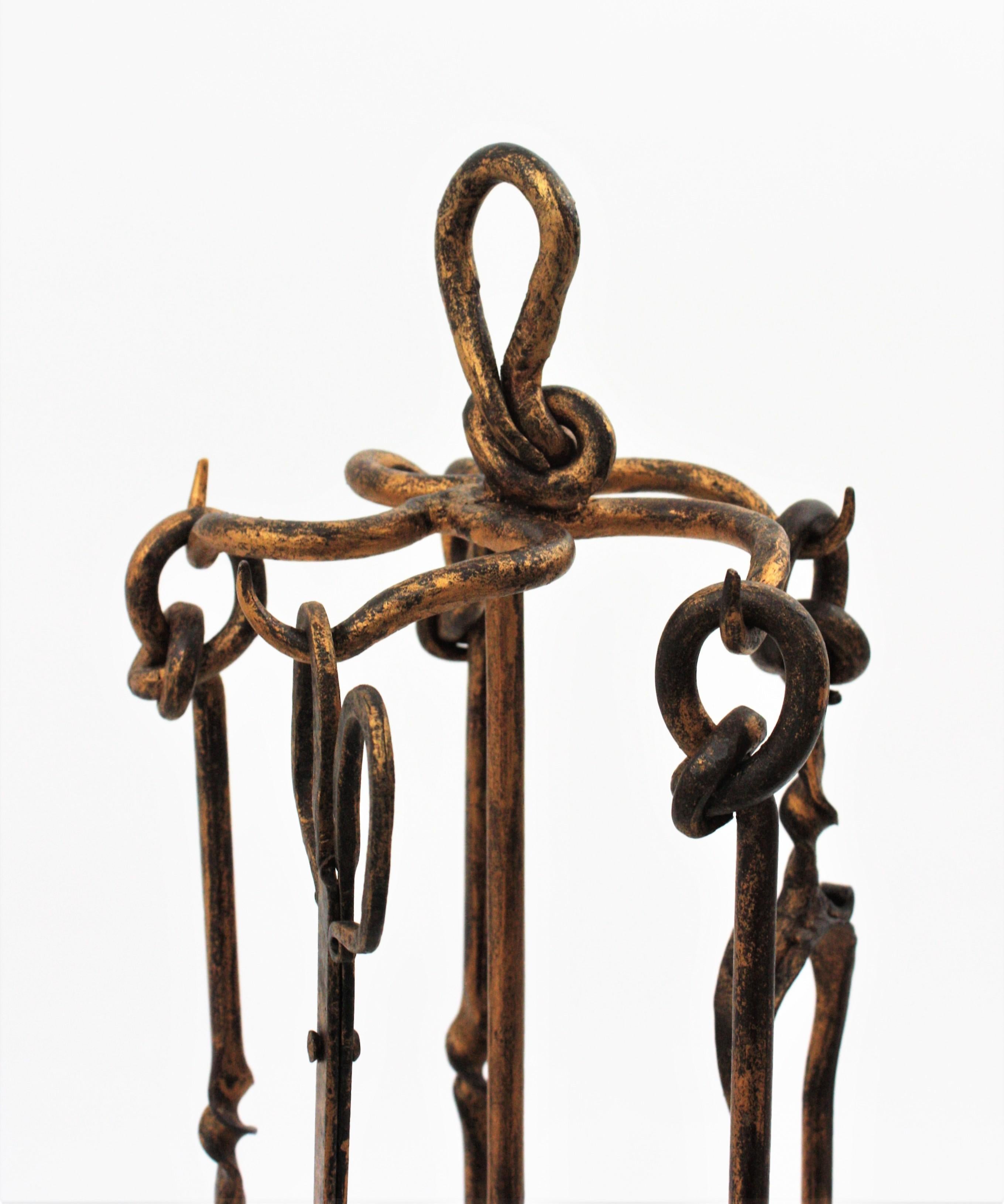 Forged Spanish Brutalist Fireplace Tool Set Stand, Gilt Wrought Iron and Knot Design For Sale